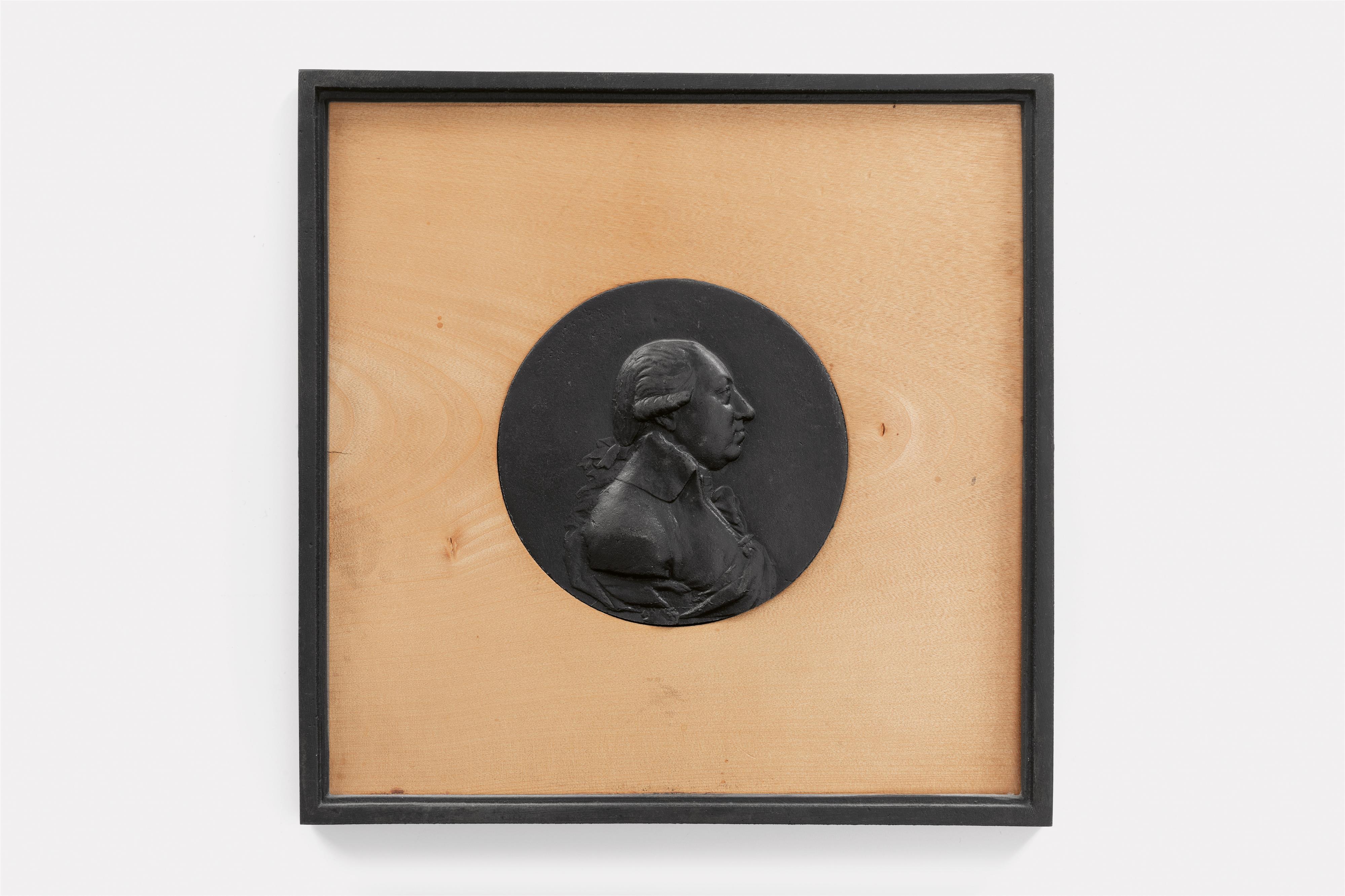 A round cast iron plaque with a portrait of King Friedrich Wilhelm II in profile - image-1