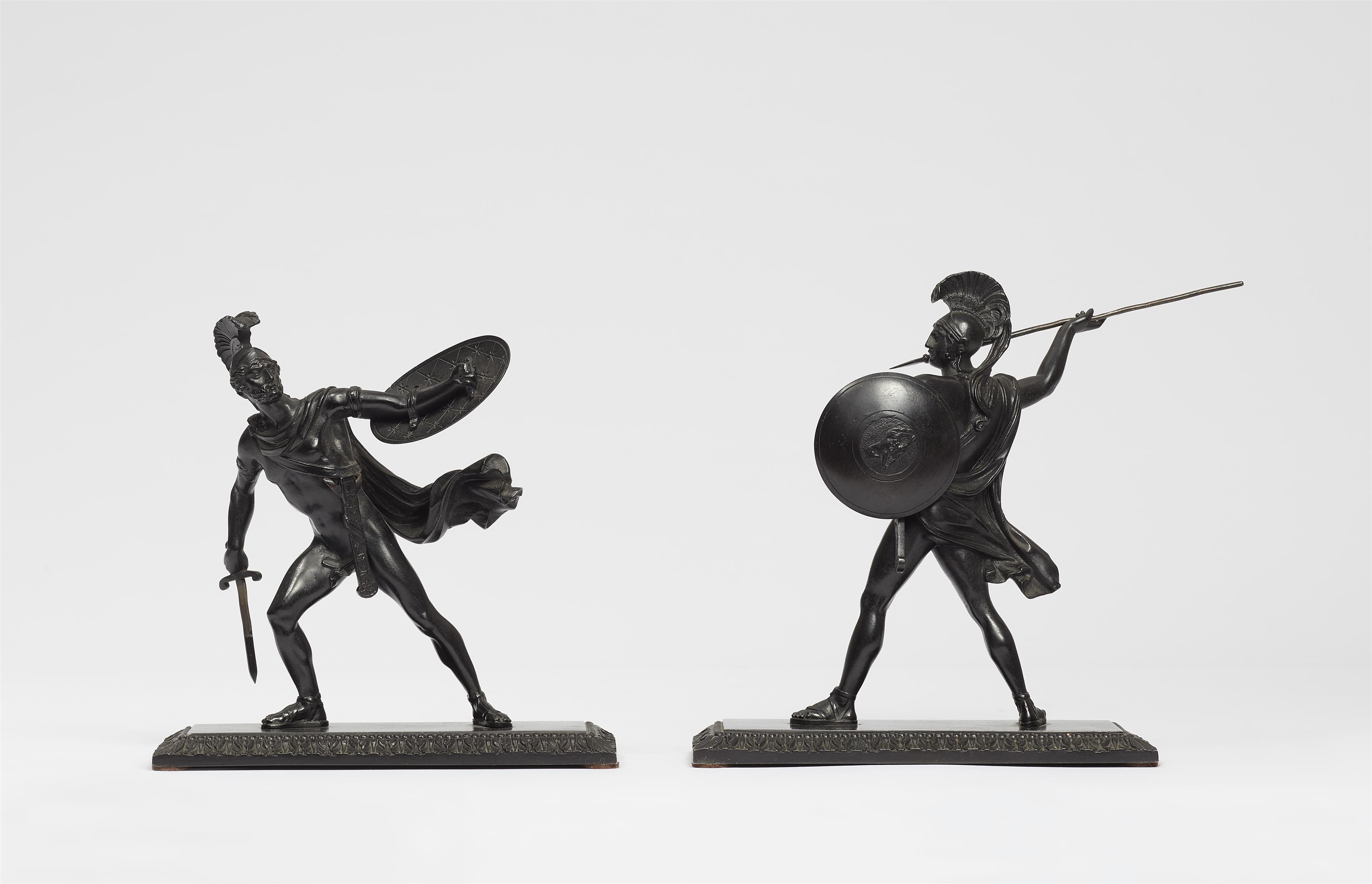 Cast iron statuettes of Romulus and Titus Tatius - image-1