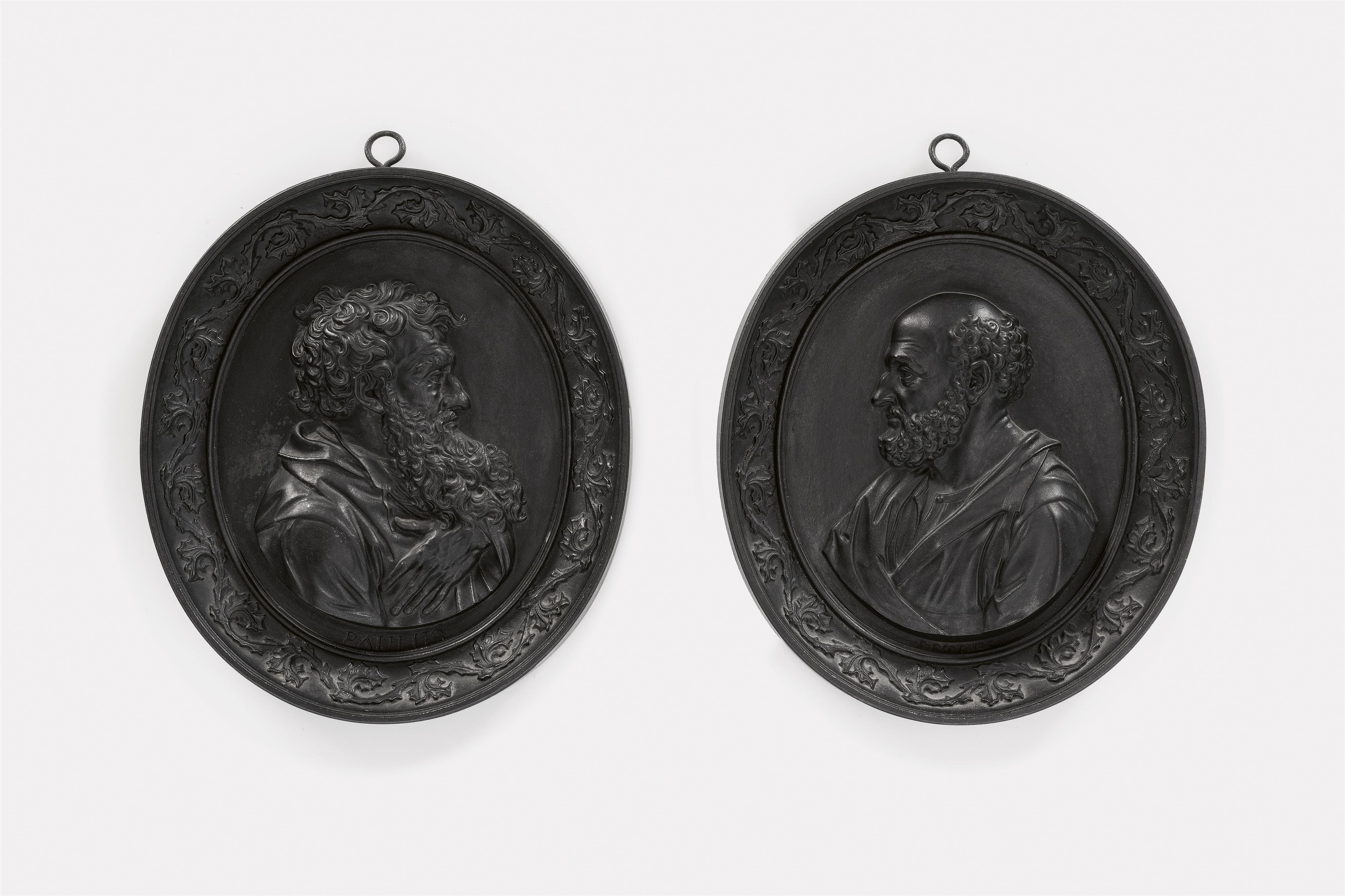A pair of oval cast iron plaques with Sts. Peter and Paul - image-1