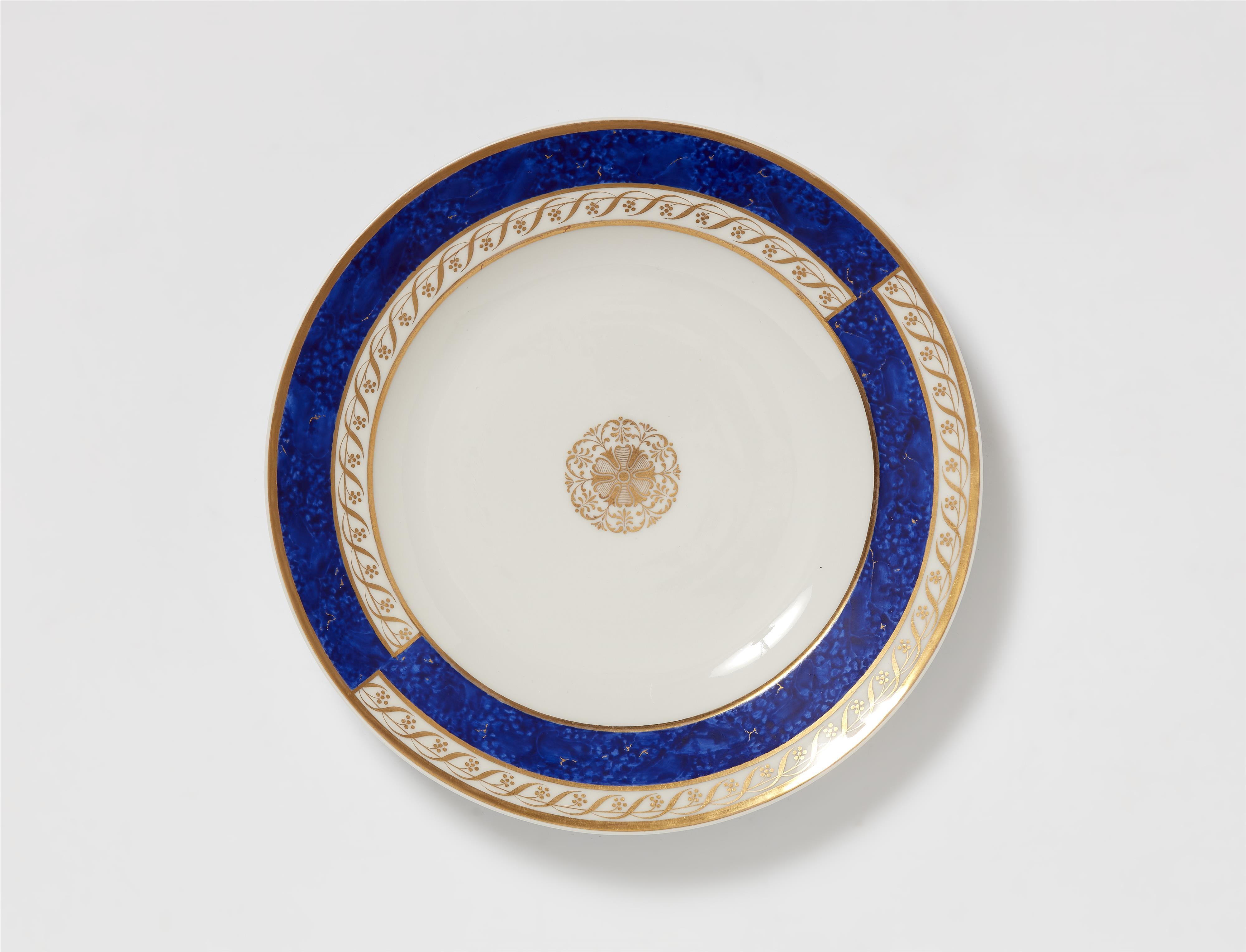 A Berlin KPM porcelain plate with various decor designs - image-1