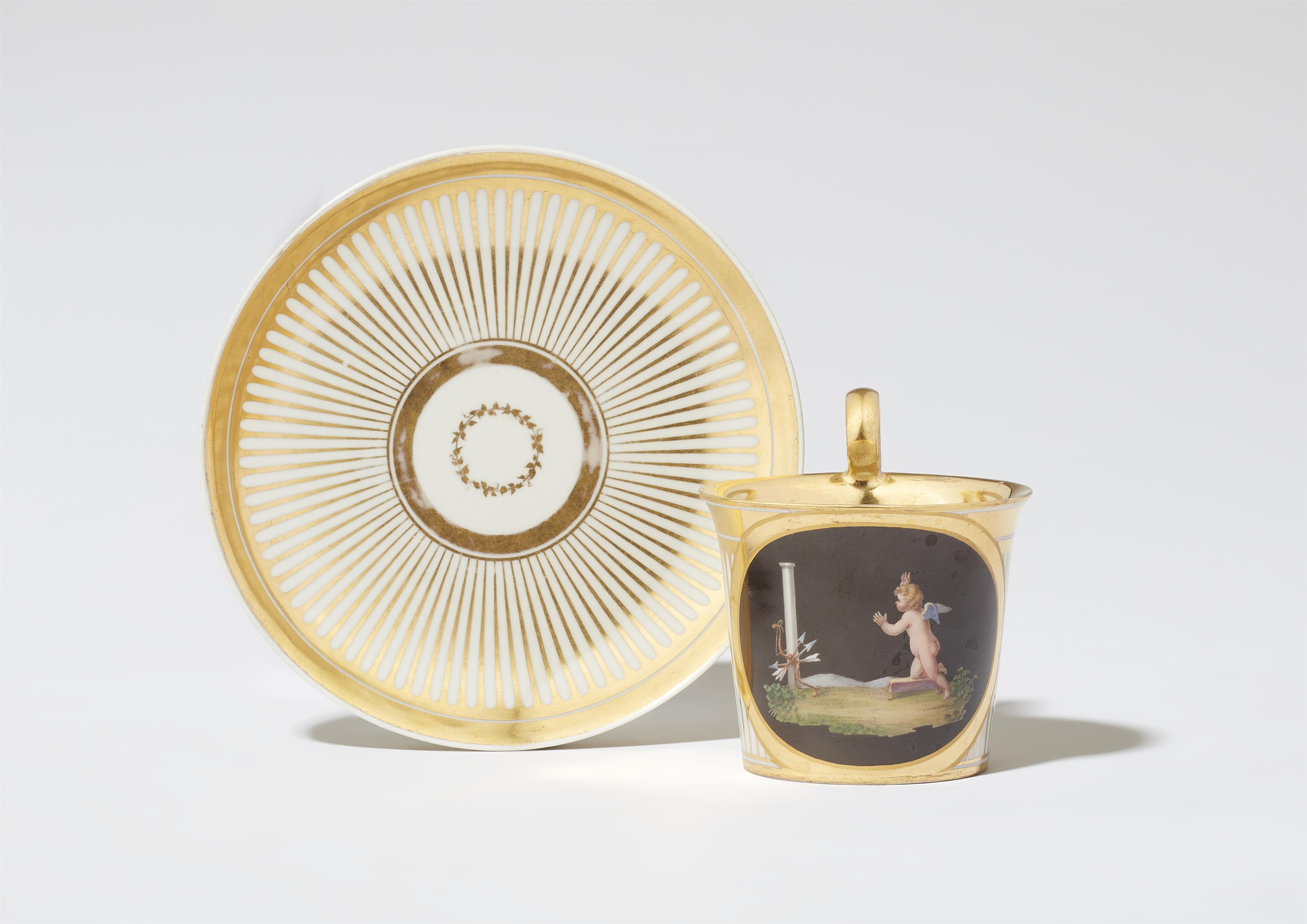 A Royal Vienna porcelain cup "Cupid rediscovers his weapons" - image-1