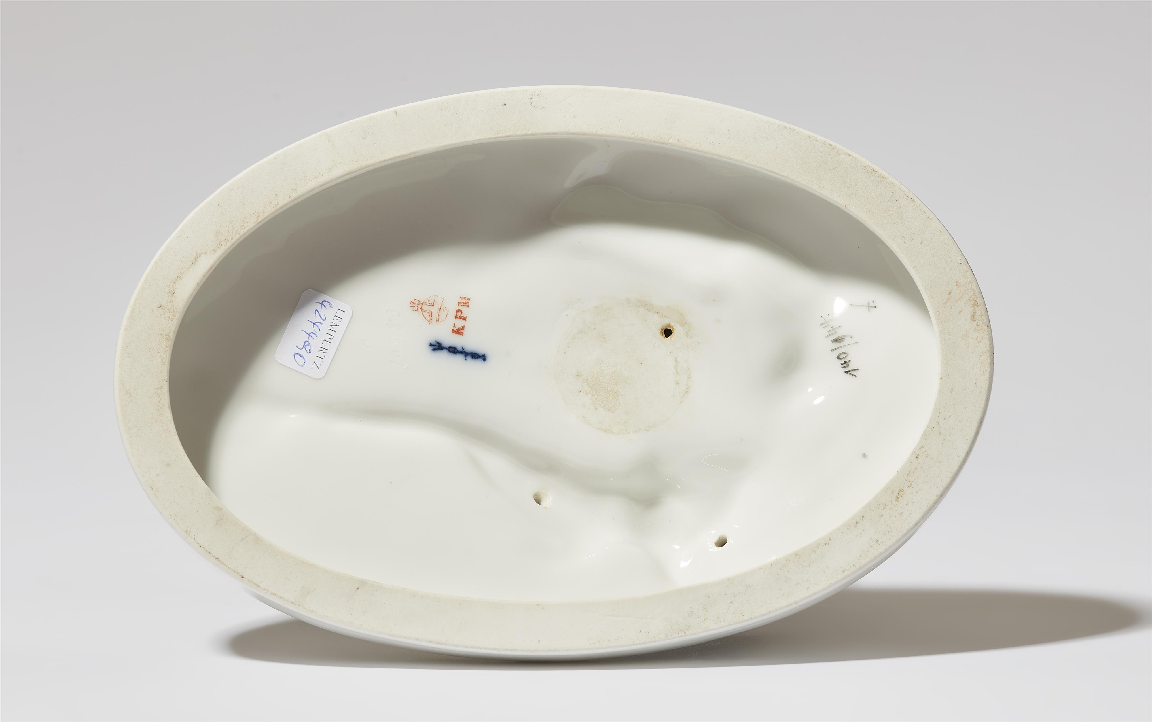 A Berlin KPM porcelain model of a bagpipe player from the "Indischer Festzug" centrepiece - image-3