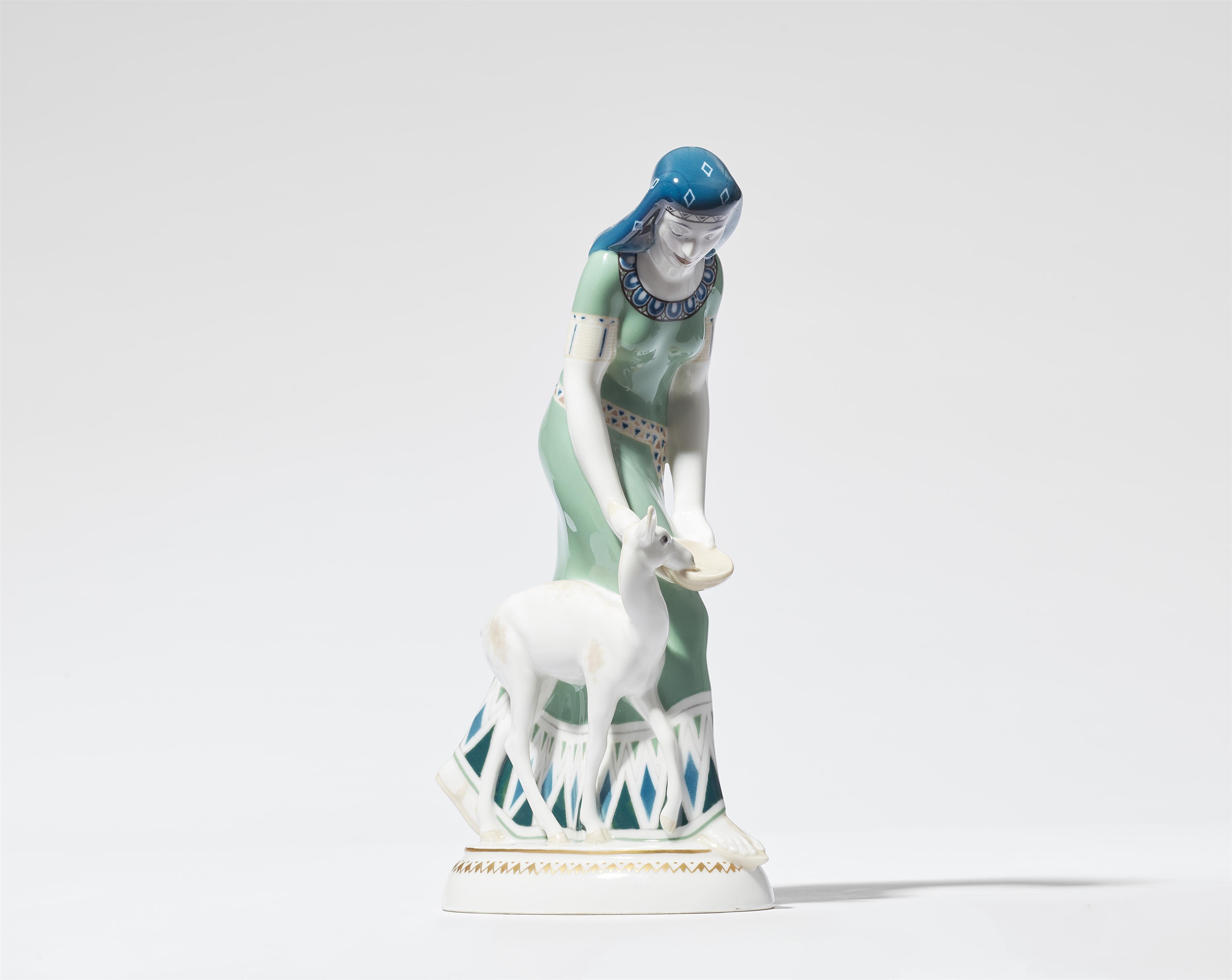 A Berlin KPM porcelain figure of an Egyptian lady with a deer - image-1