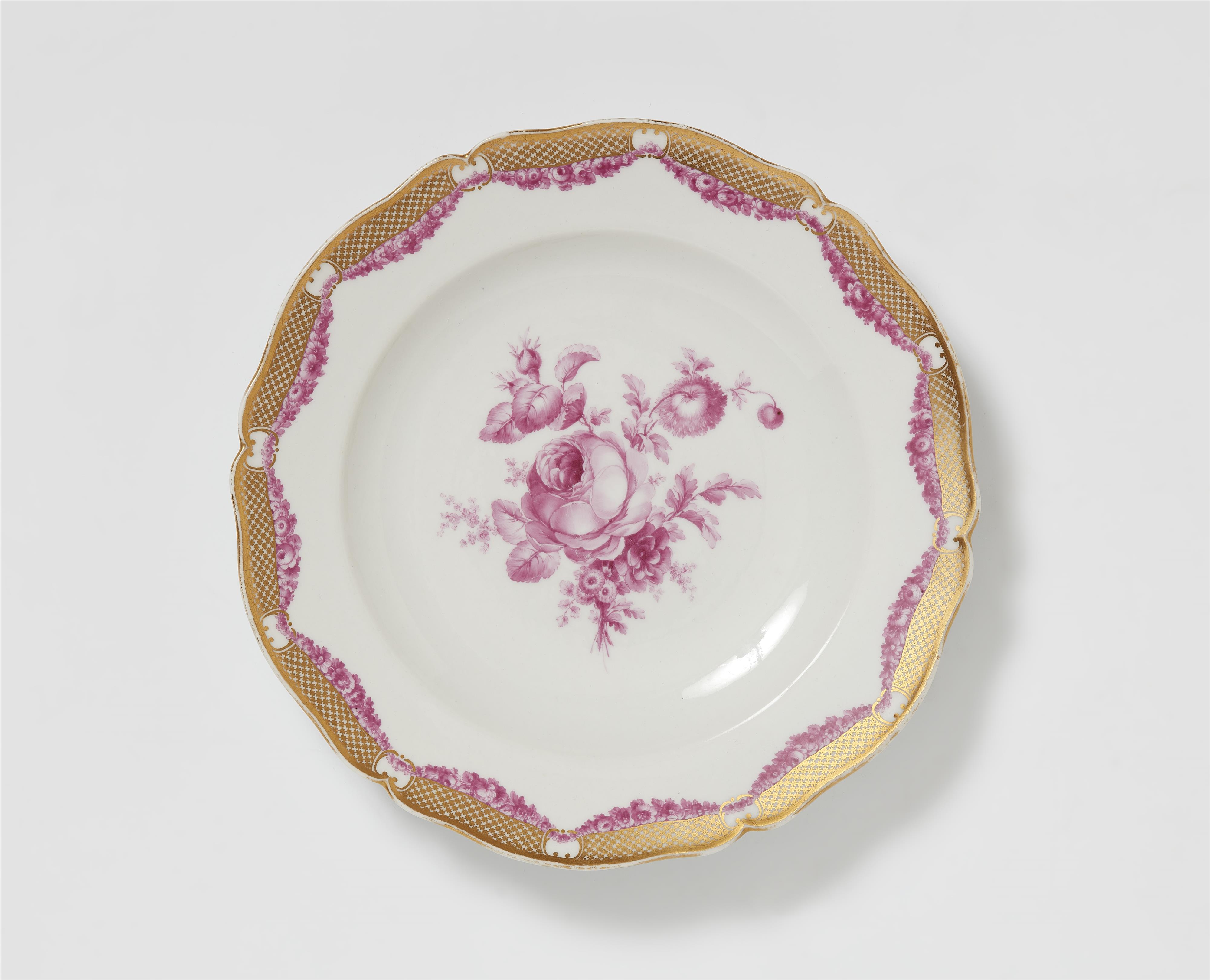 A Berlin KPM porcelain plate from the royal dinner service with purple flowers - image-1