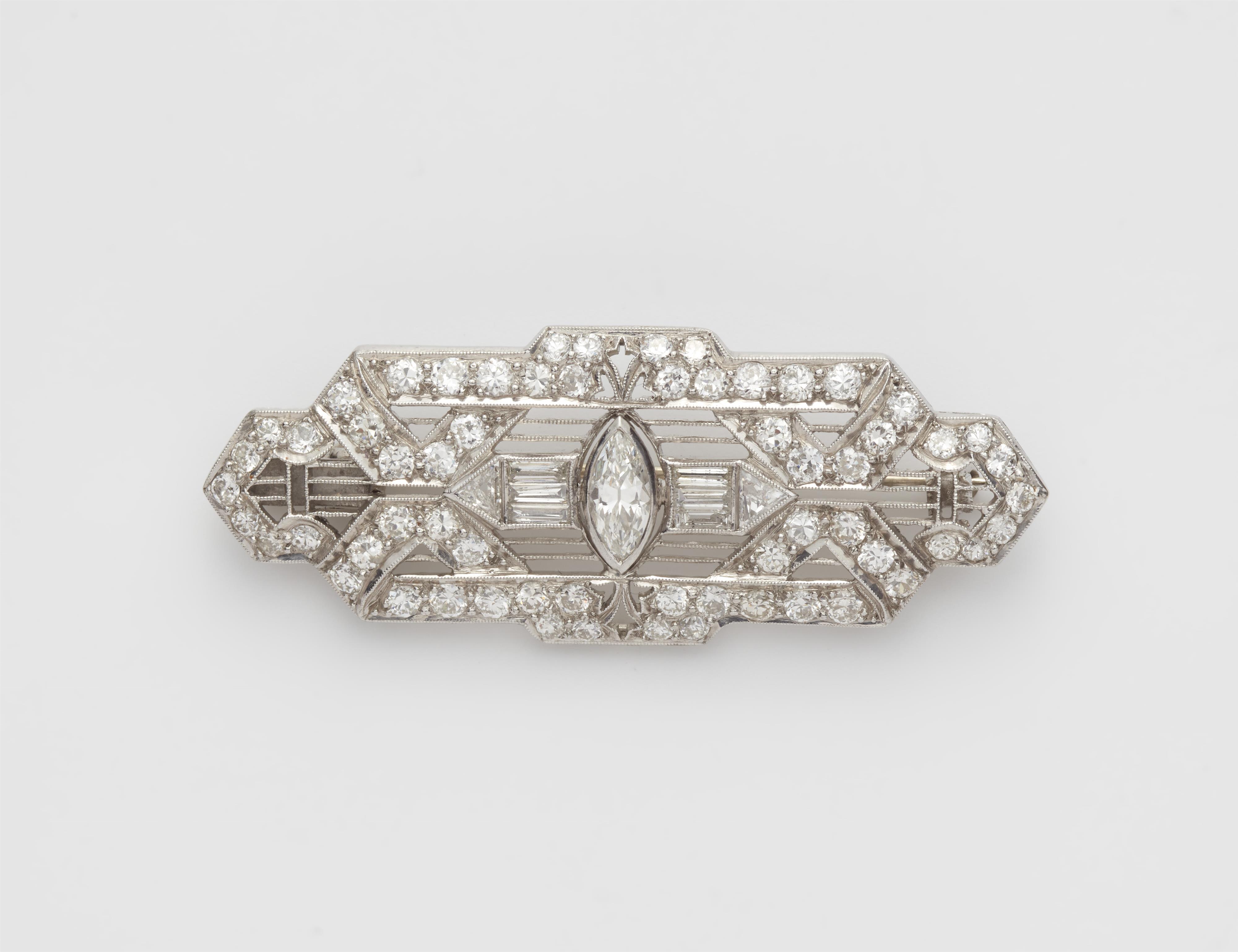 A platinum and diamond Art Déco brooch. - image-1