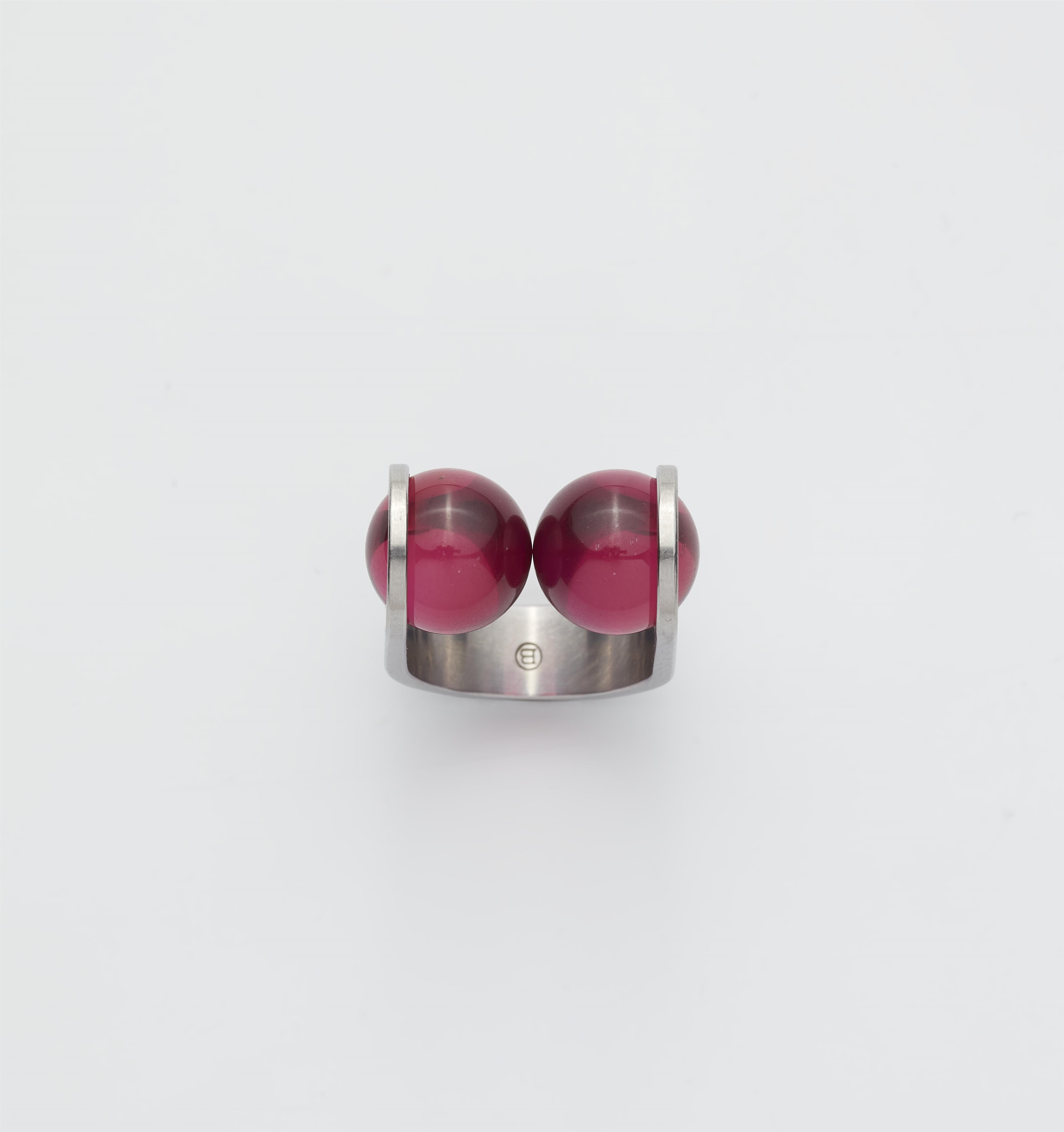A German steel and synthetic ruby ring. - image-1
