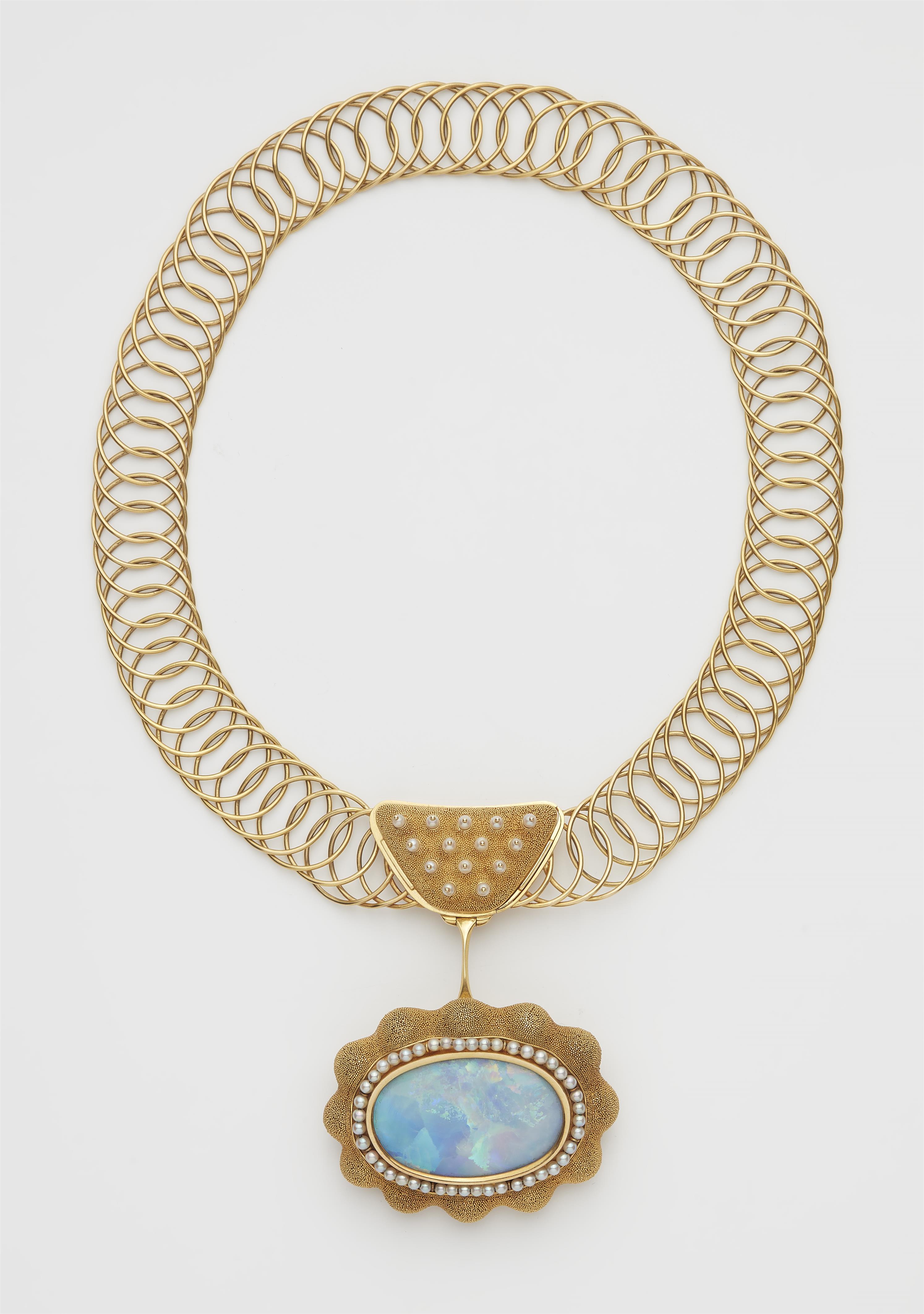 A German hand-forged 18k gold wire necklace with a large granulation and black opal pendant brooch. - image-1