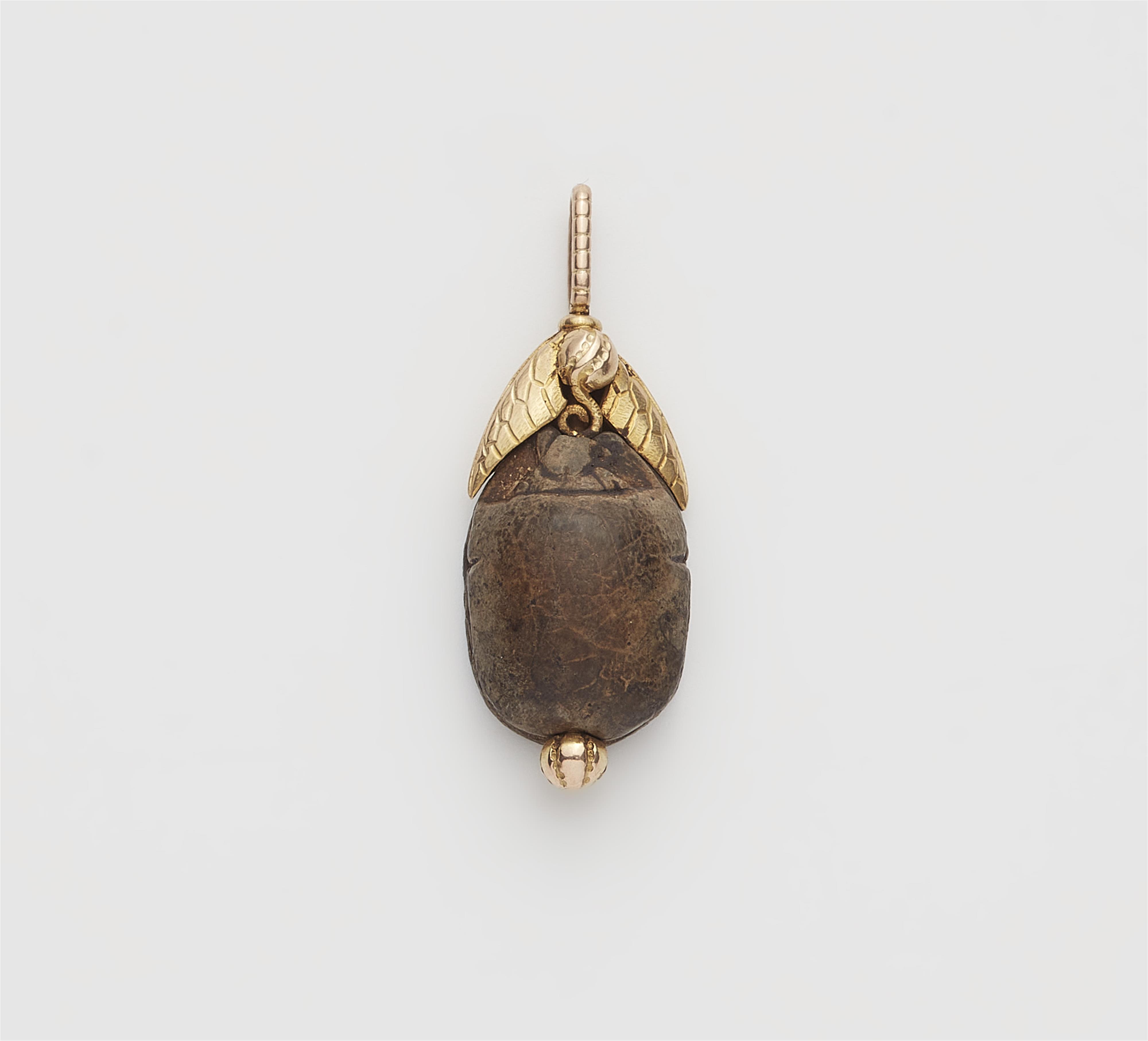 A Neoclassical 14k gold and Ancient Egyptian steatite scarab pendant. - image-1