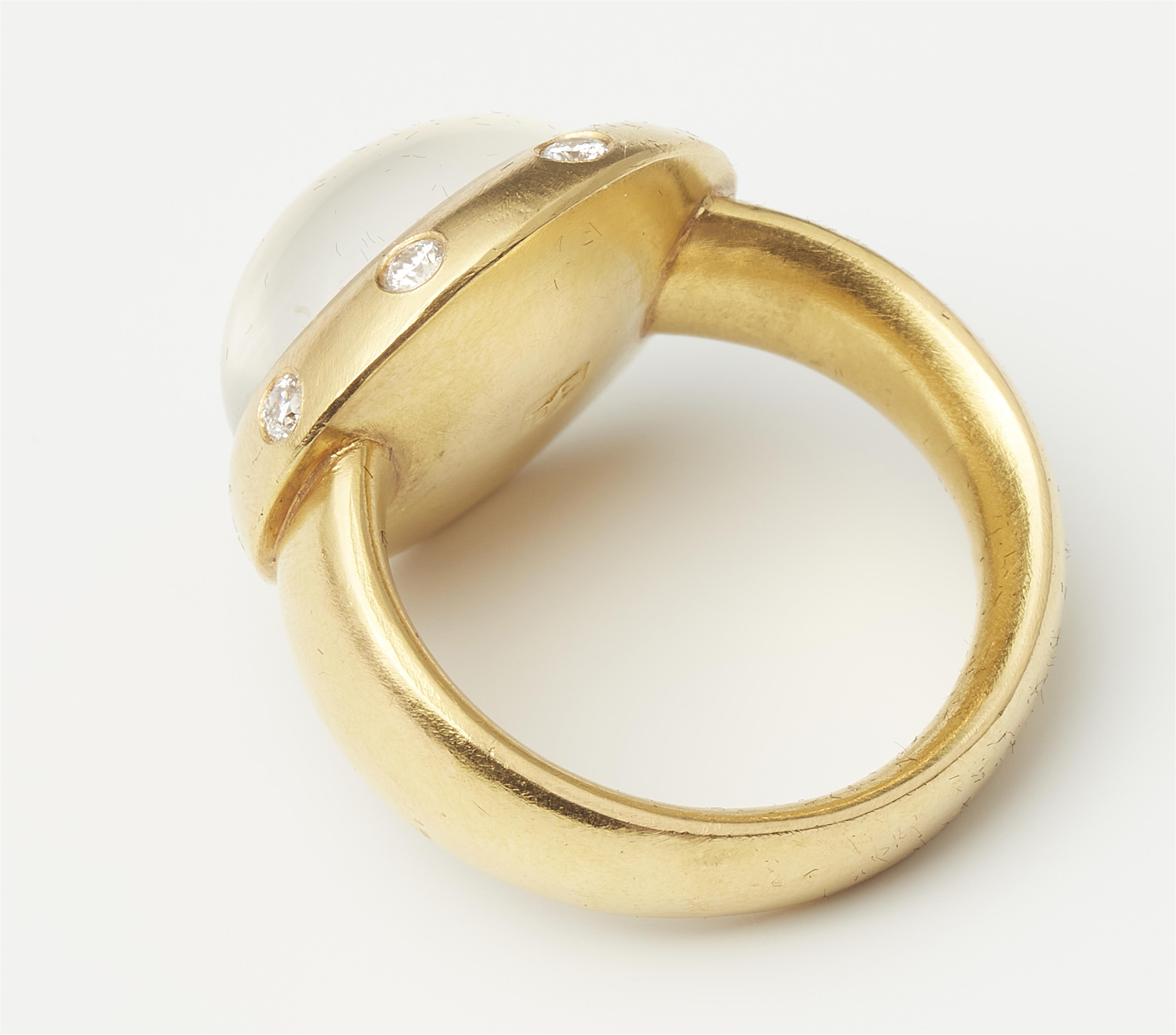 A hand forged 18k gold and diamond ring with large moonstone cabochon. - image-2