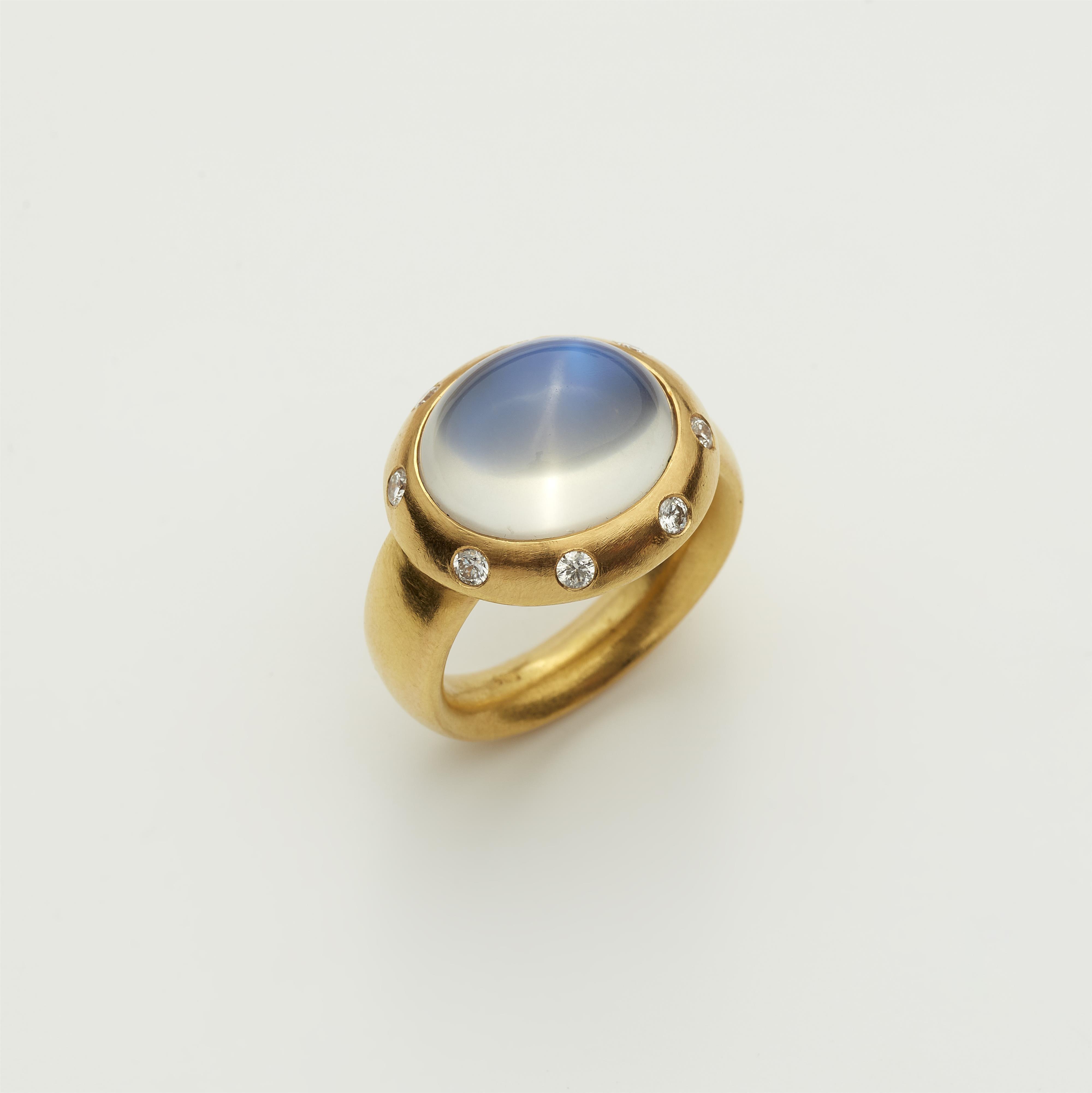 A hand forged 18k gold and diamond ring with large moonstone cabochon. - image-1