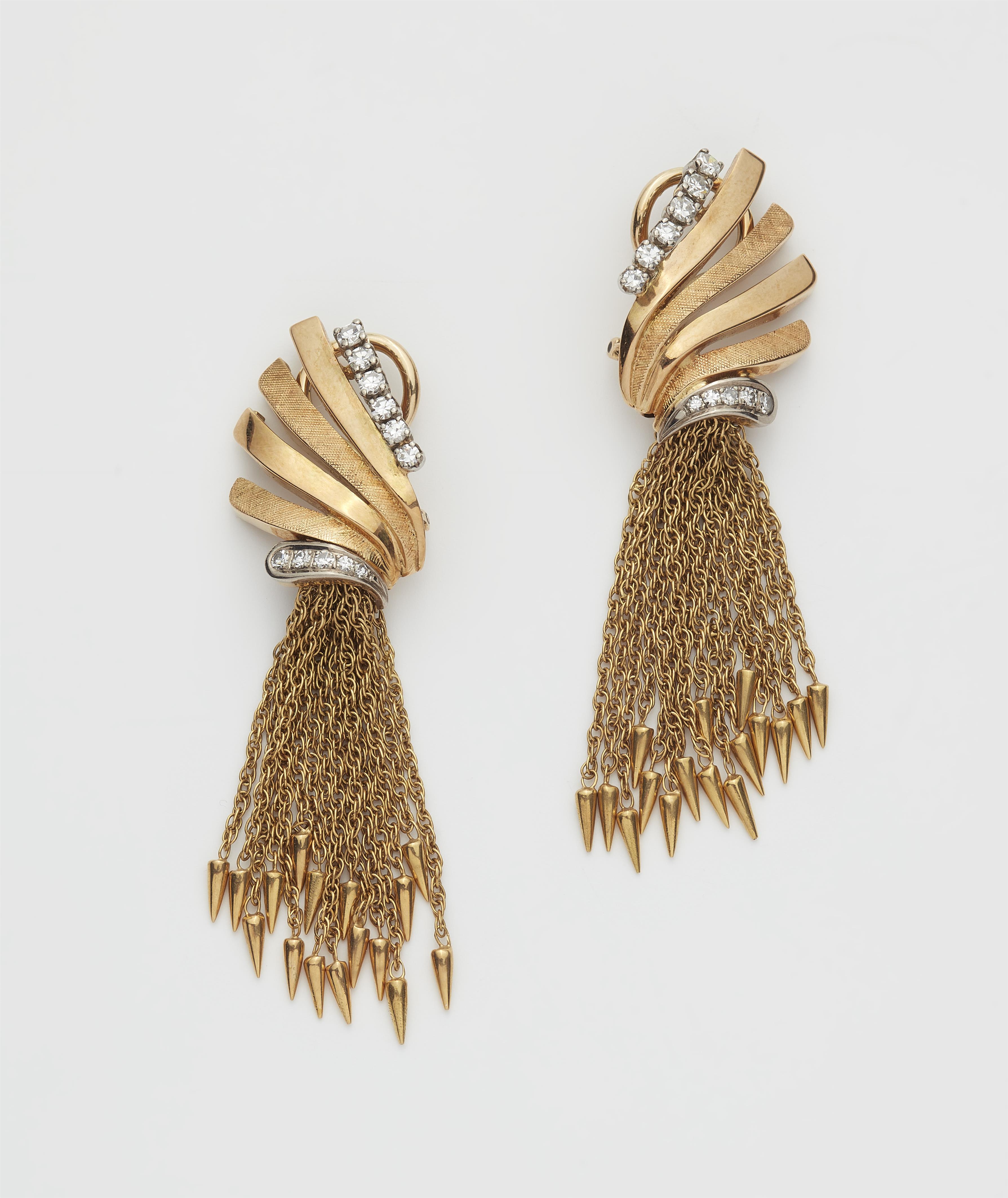 A German pair of 18k gold and diamond tassel clip earrings. - image-1