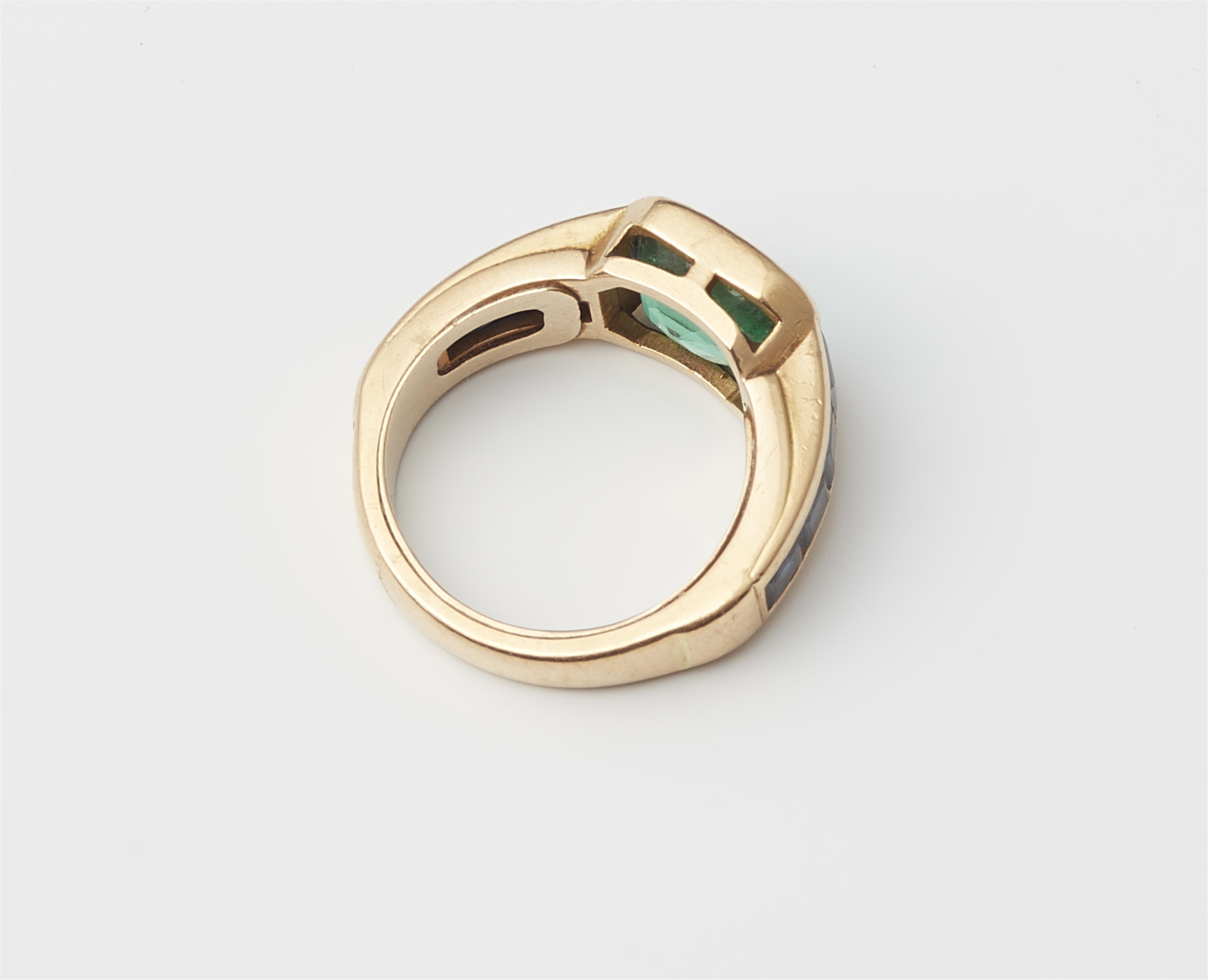 A German 18k gold sapphire and emerald ring. - image-2