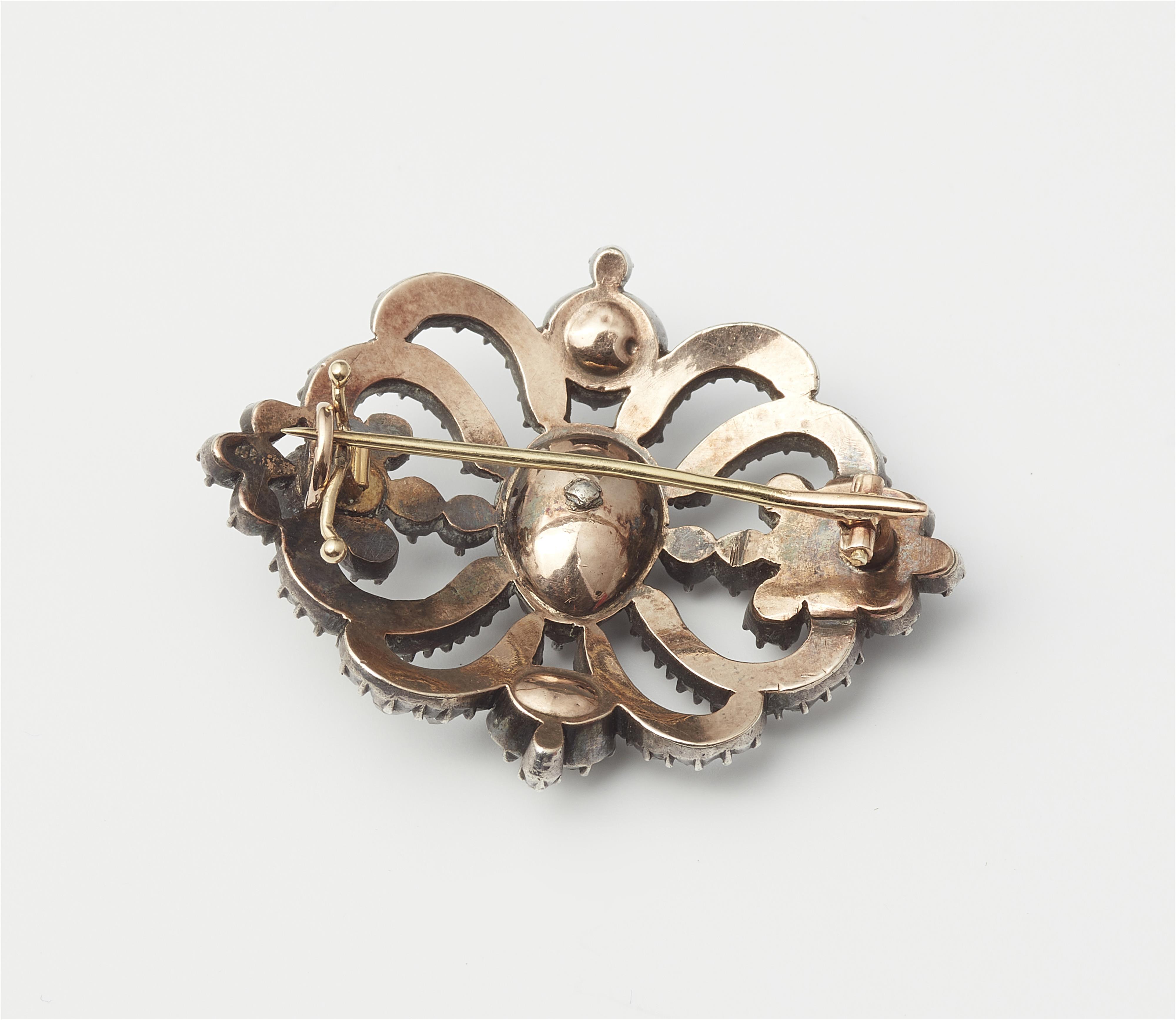 A silver 14k gold and foiled rose-cut diamond brooch. - image-2