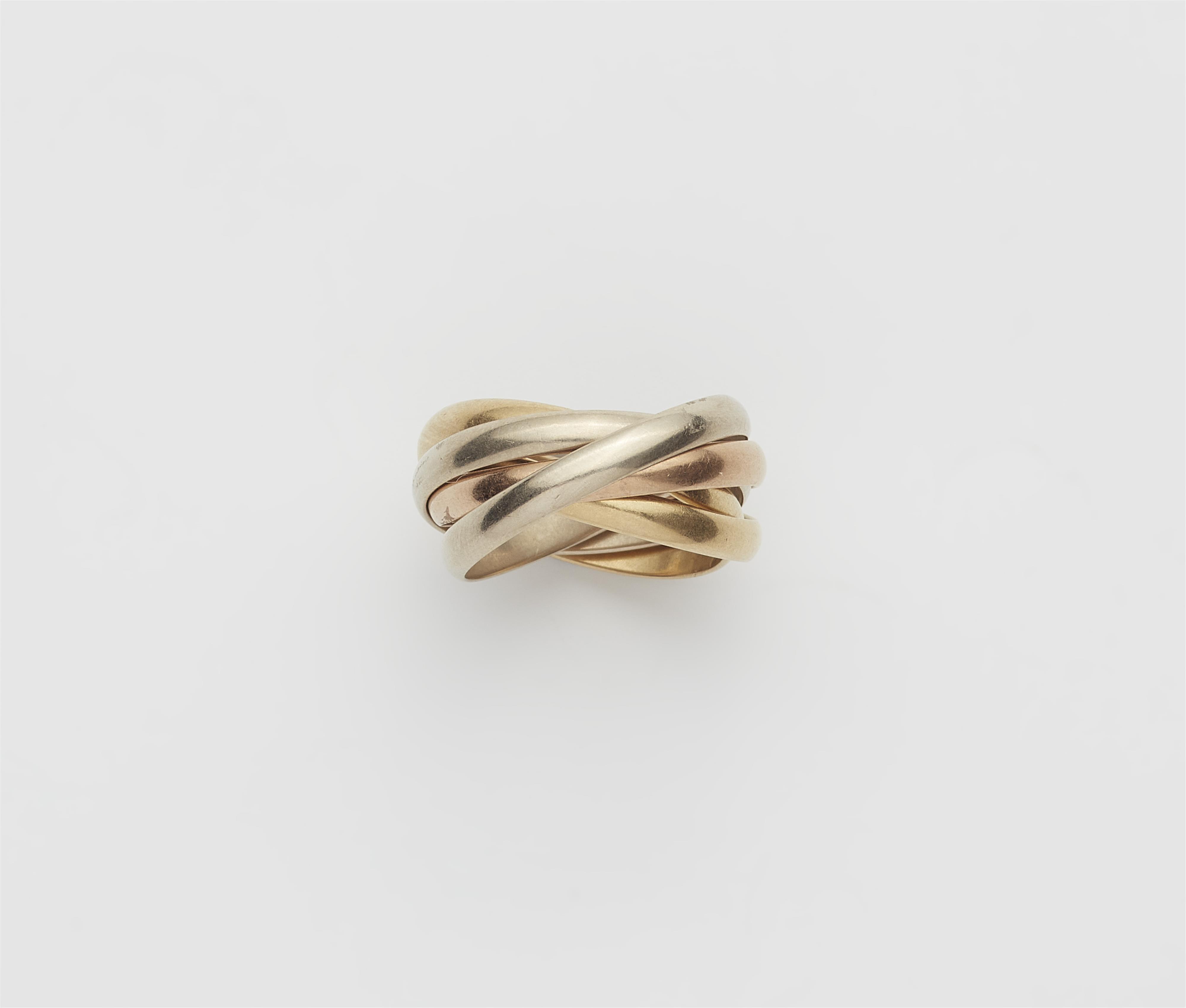 A five band 18 kt gold Trinity ring. - image-1