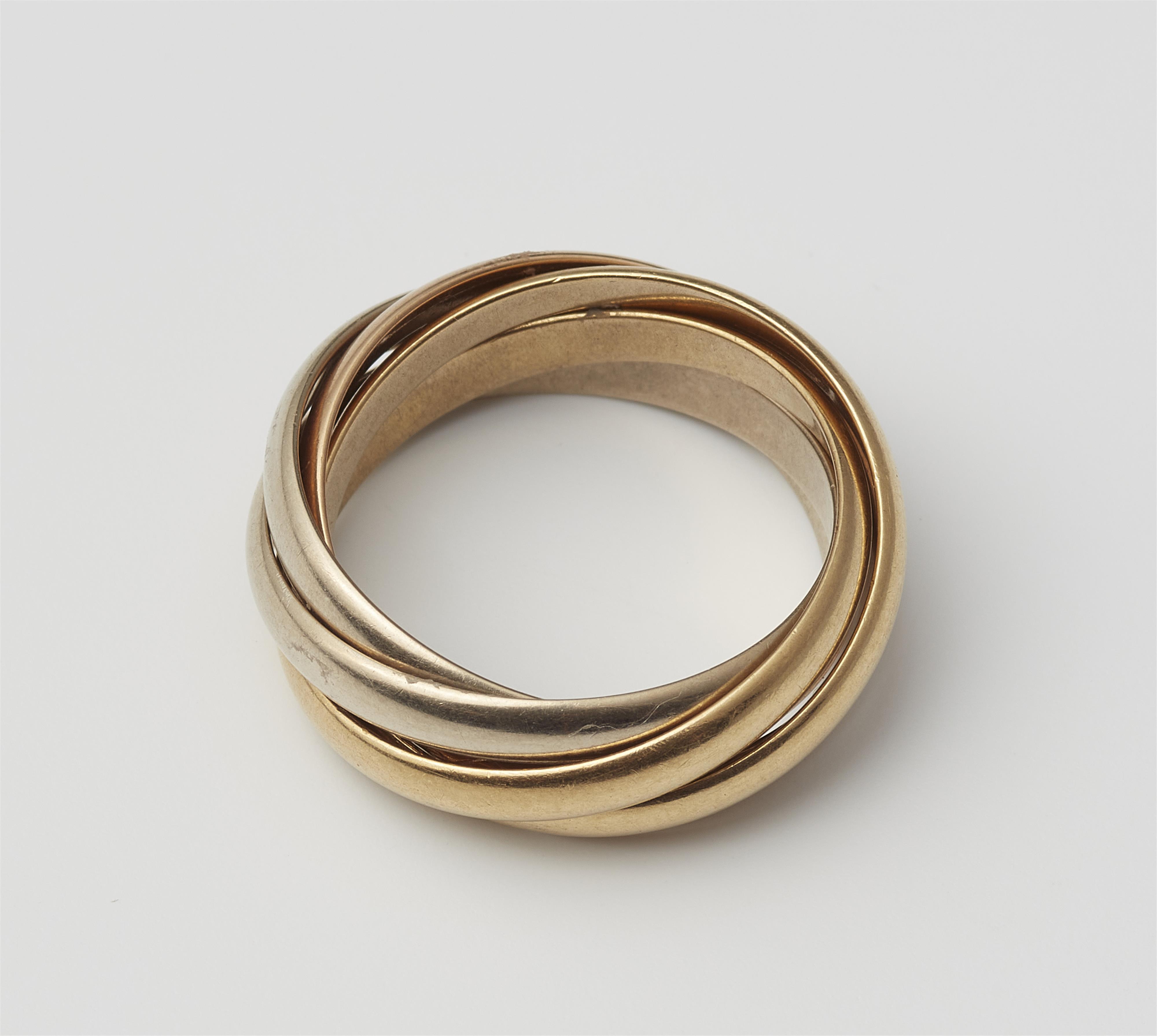 A five band 18 kt gold Trinity ring. - image-3