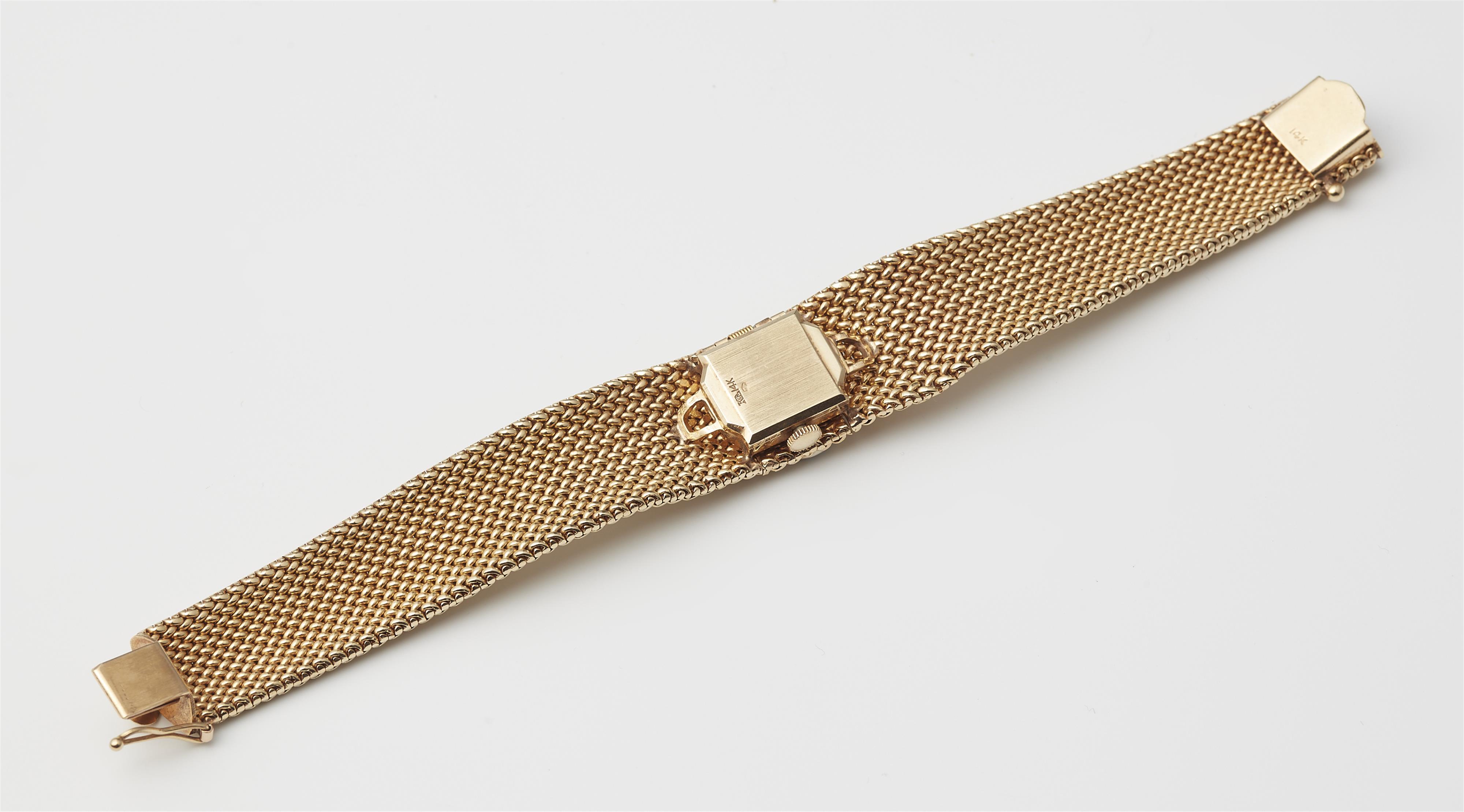 A 14k gold mesh and diamond bracelet with concealed Longines ladies watch. - image-3