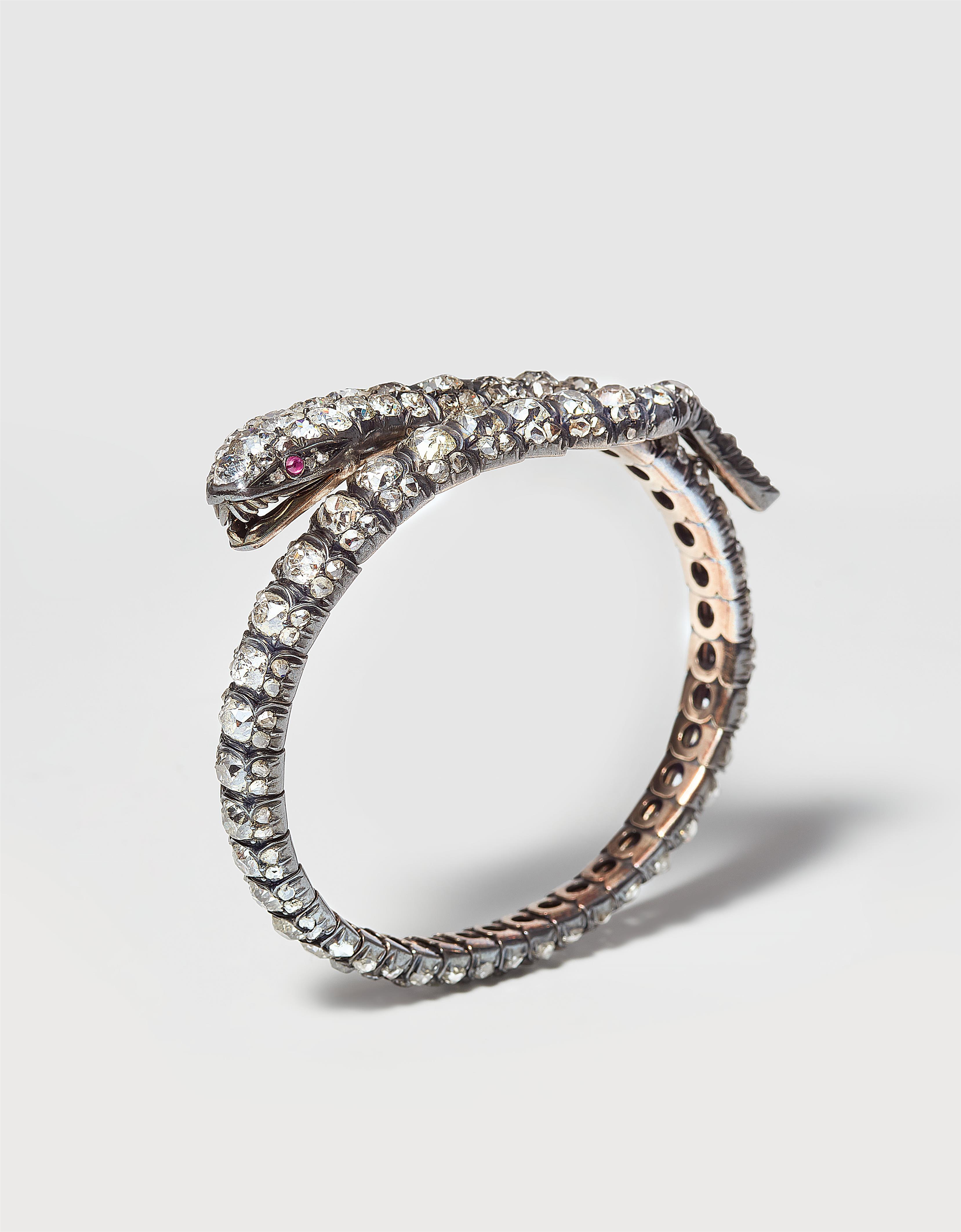 A Victorian 14k gold silver and European old-cut diamond snake bangle. - image-1