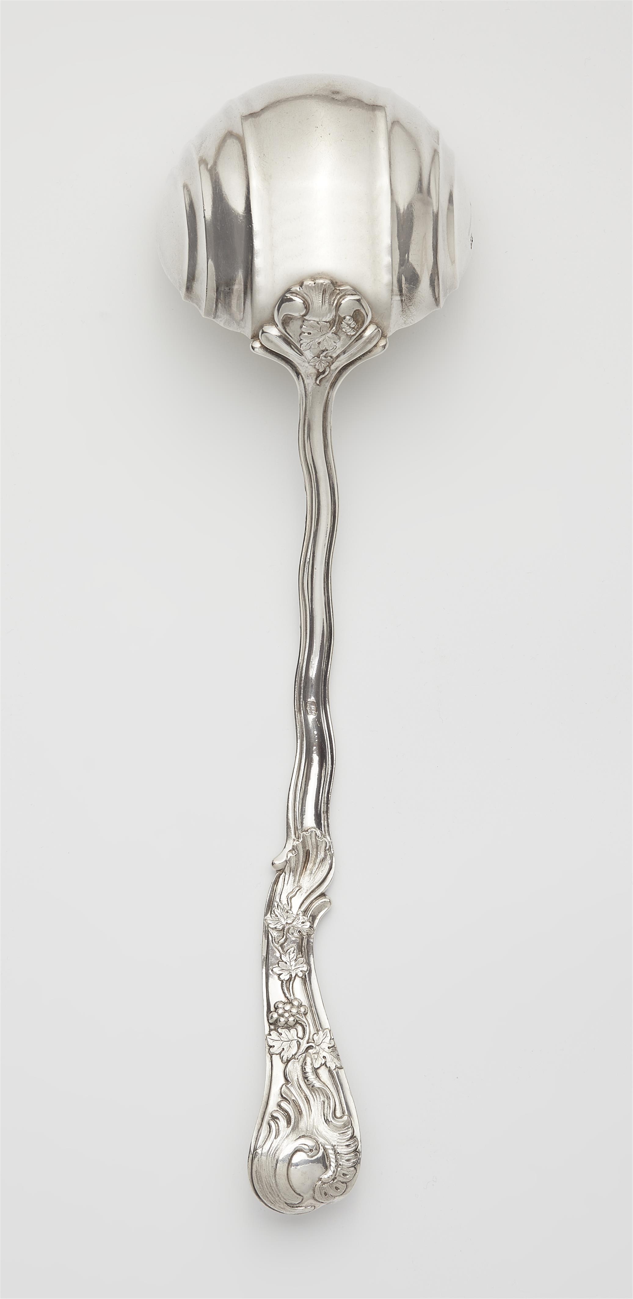 A large Berlin Rococo parcel gilt silver ladle - image-3