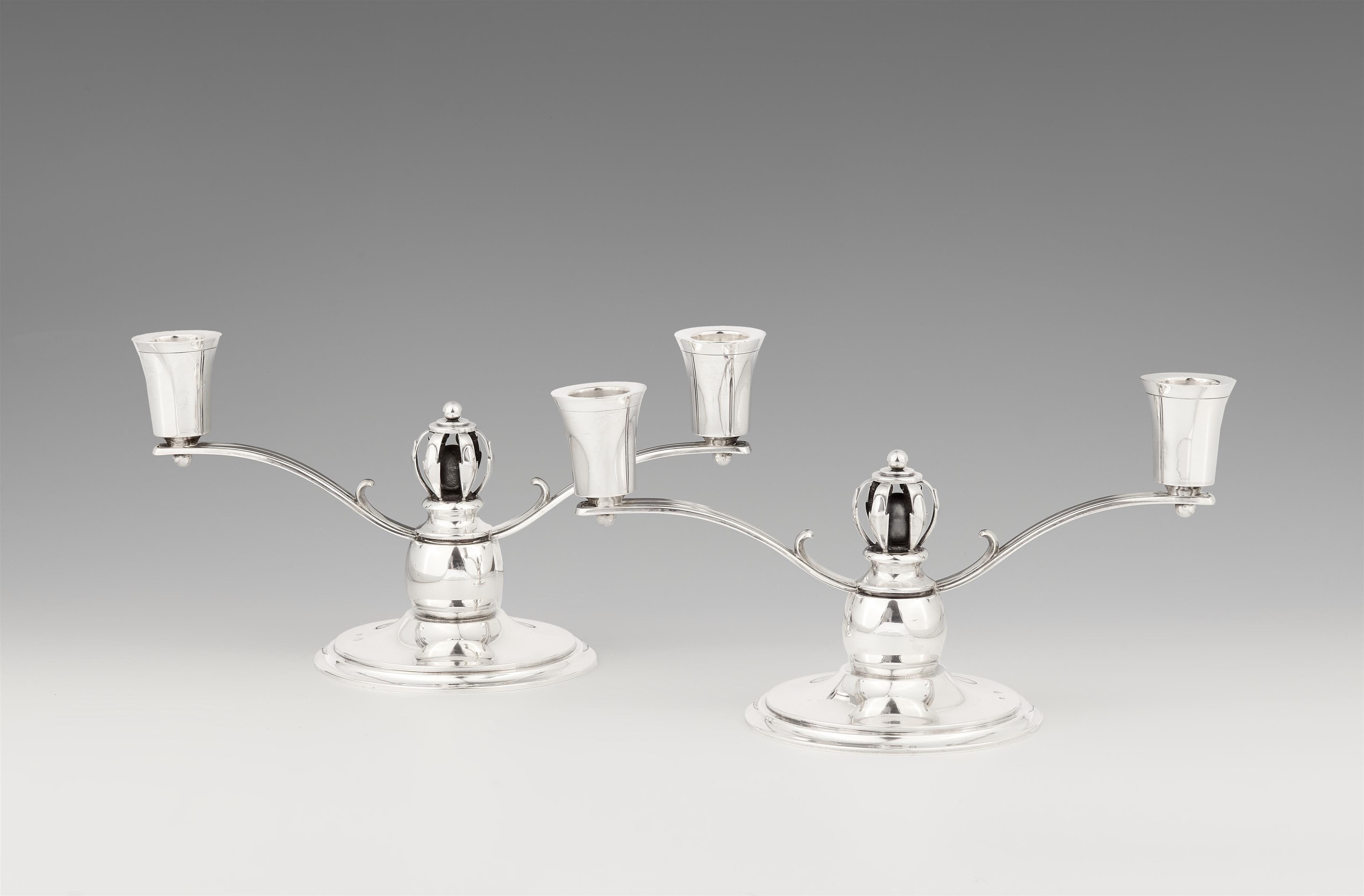 A pair of Art Deco Copenhagen silver candlesticks - image-1