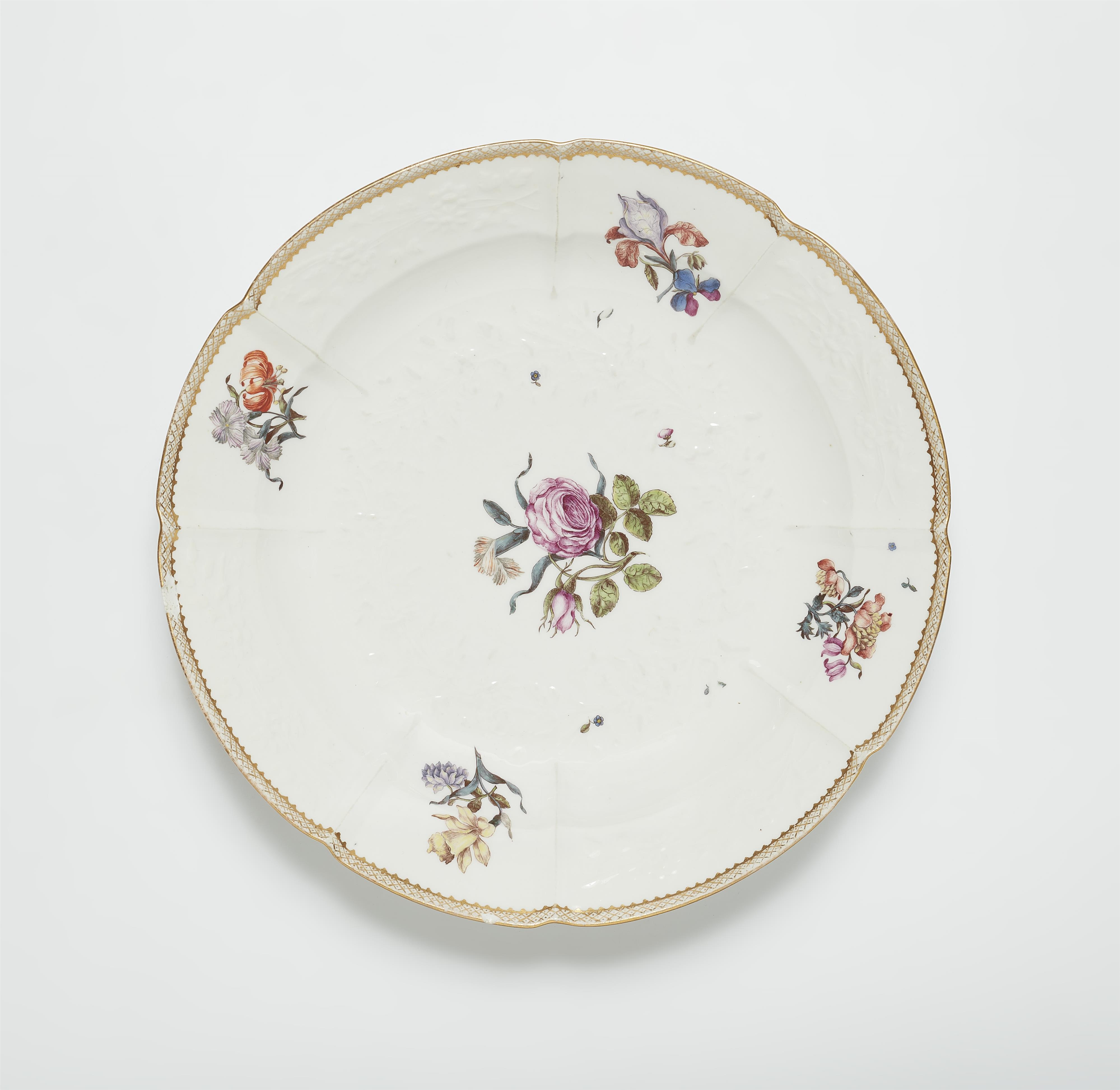 A Meissen porcelain dish from a dinner service with woodcut style flowers - image-1