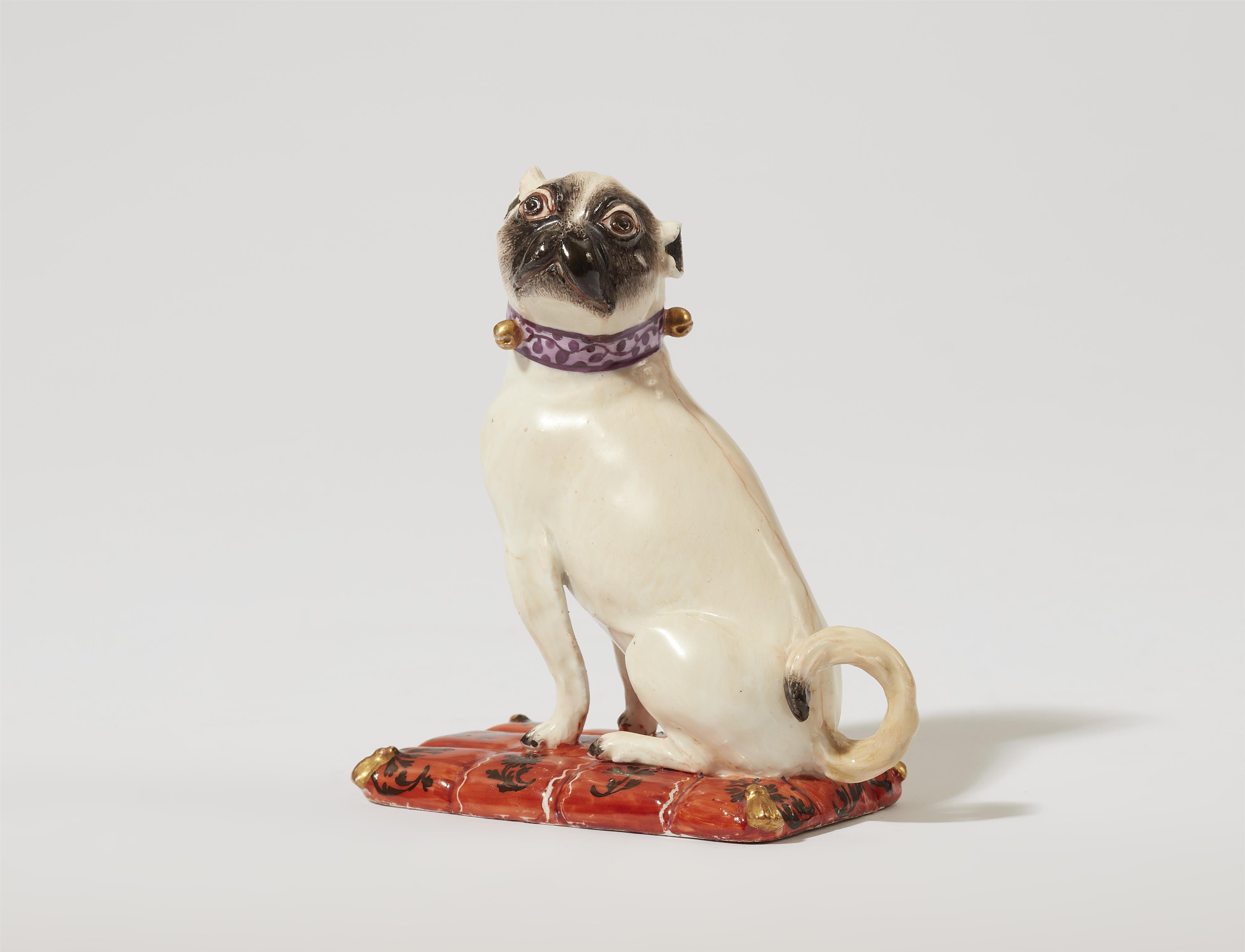 A Meissen porcelain model of a pug dog on a cushion - image-1