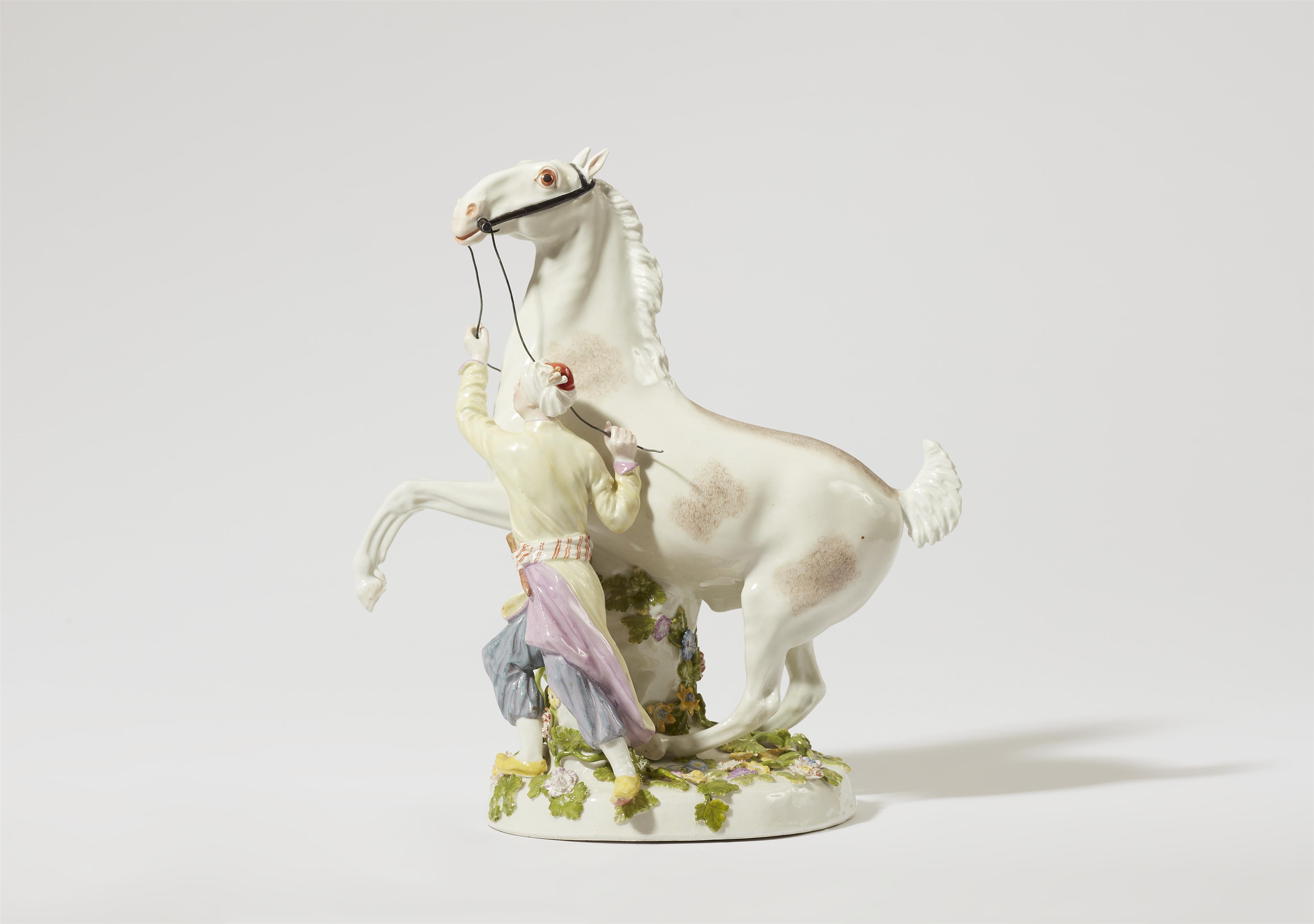A Meissen porcelain model of a Turkish man taming a rearing horse - image-1