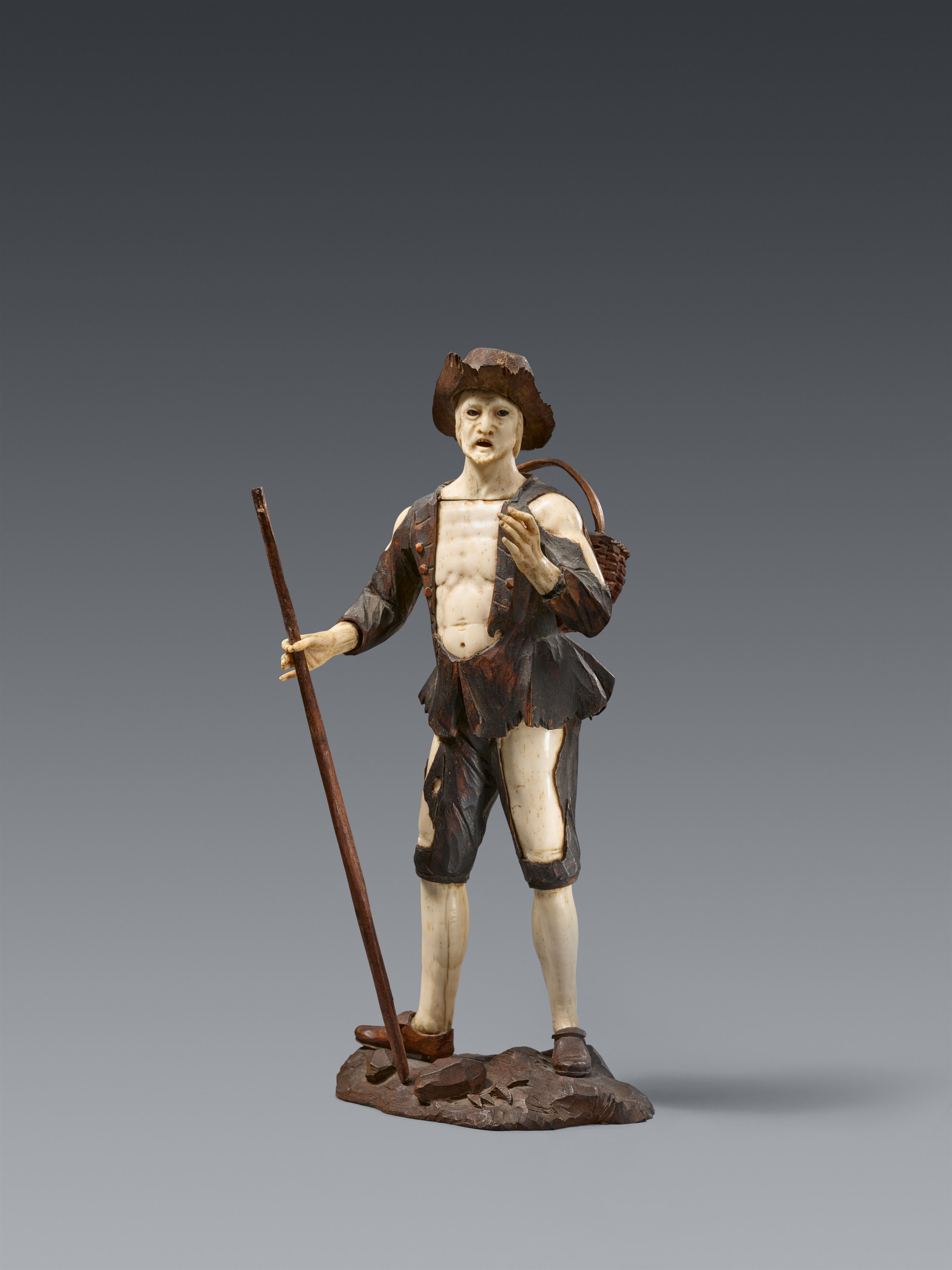 Simon Troger, attributed to - A carved ivory figure of a travelling peddlar, attributed to Simon Troger - image-1