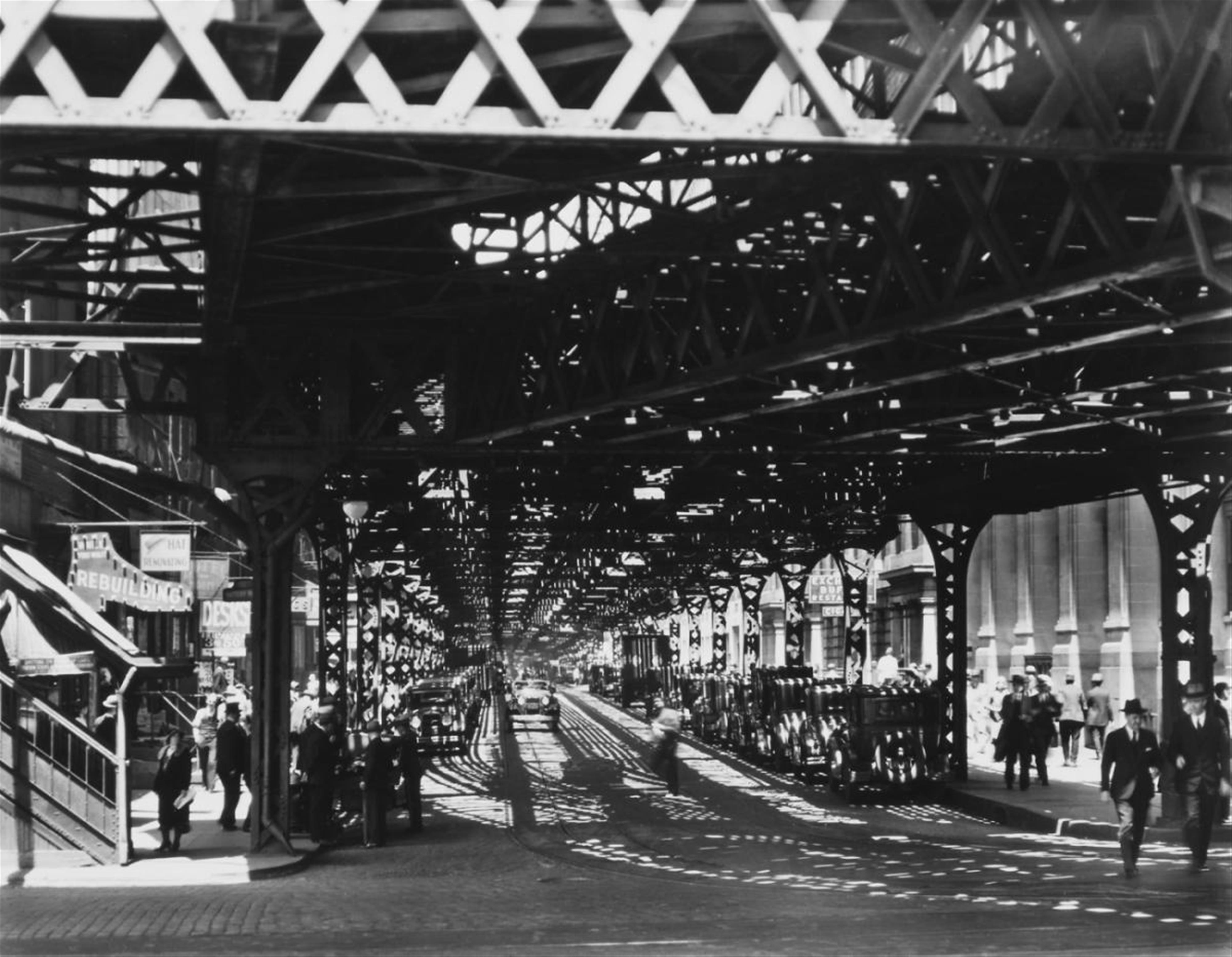 Berenice Abbott - UNDER THE EL AT THE BATTERY - image-1