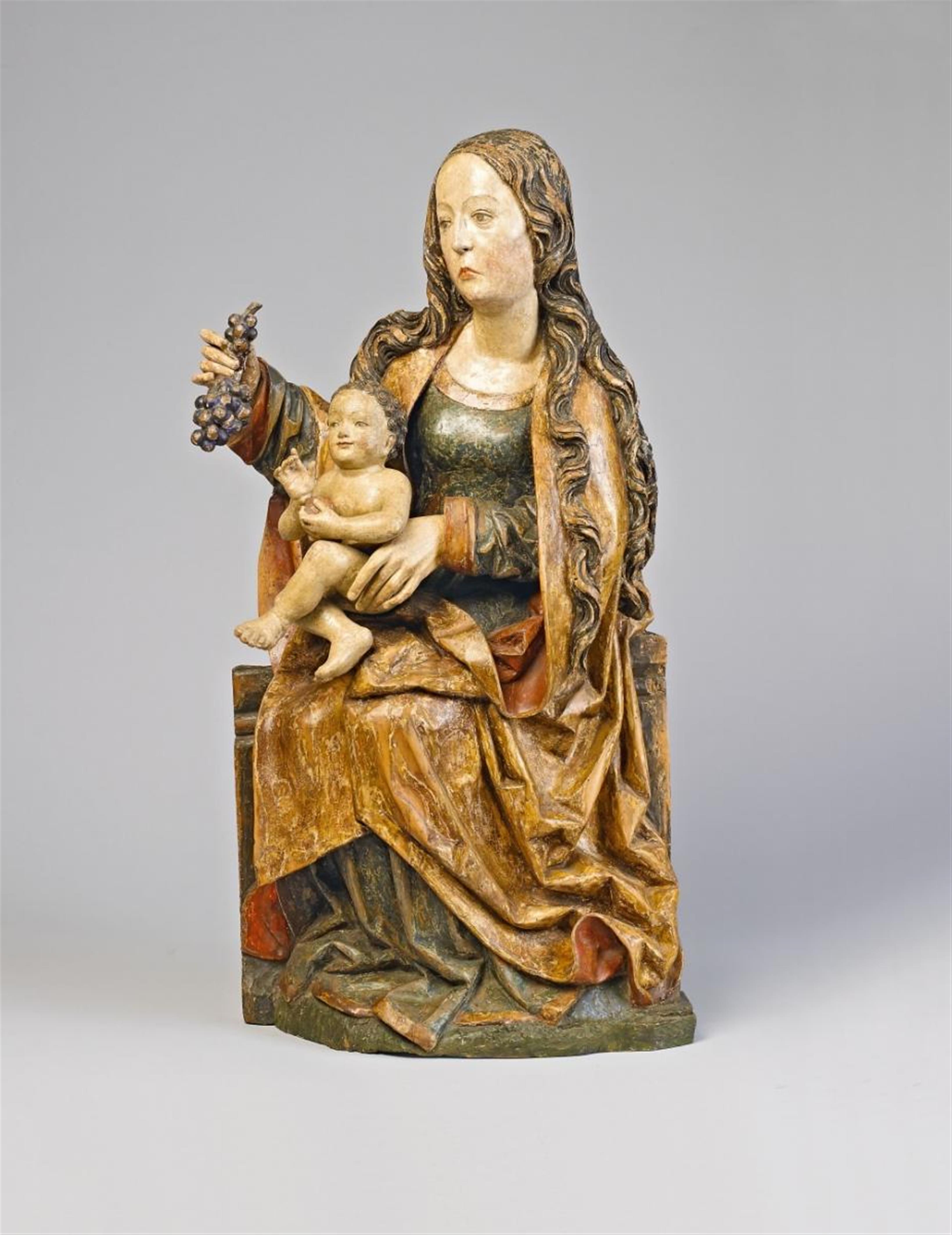 A carved high relief wood figure of THE VIRGIN WITH CHILD - image-1