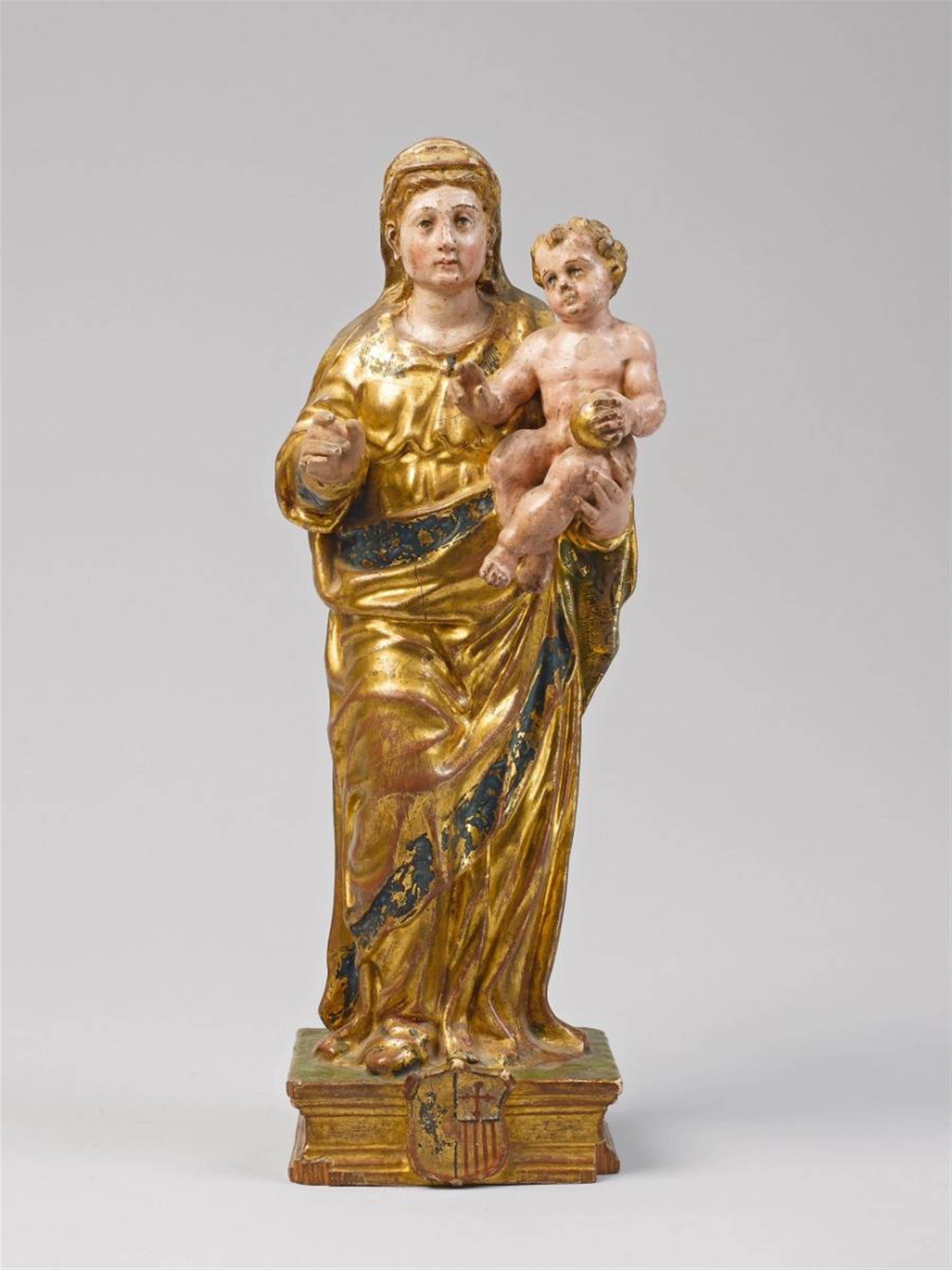 A carved and polychrome wood group of THE VIRIGIN WITH CHILD - image-1