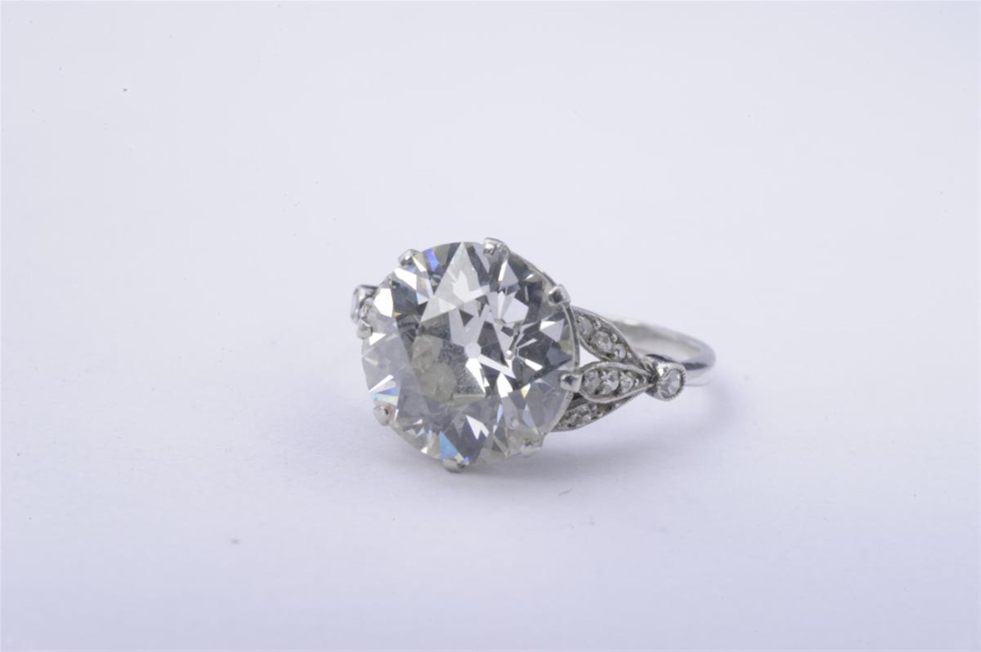 A platinum Belle Epoque solitaire ring. - image-1
