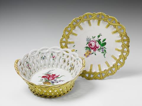 A Strasbourg faience basket and platter with mixed floral decor. - 