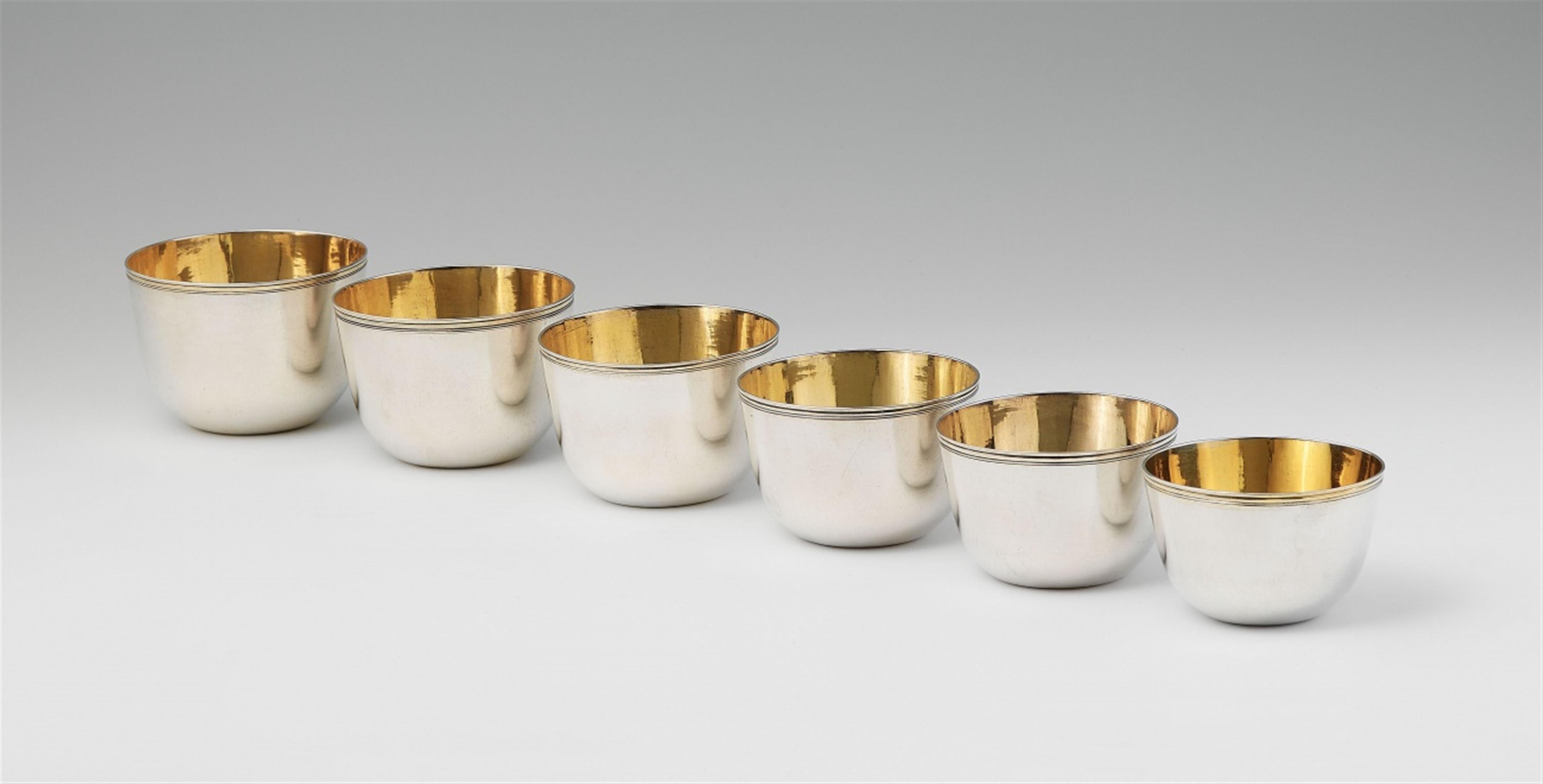 A rare set of six Augsburg silver gilt nesting beakers - 
