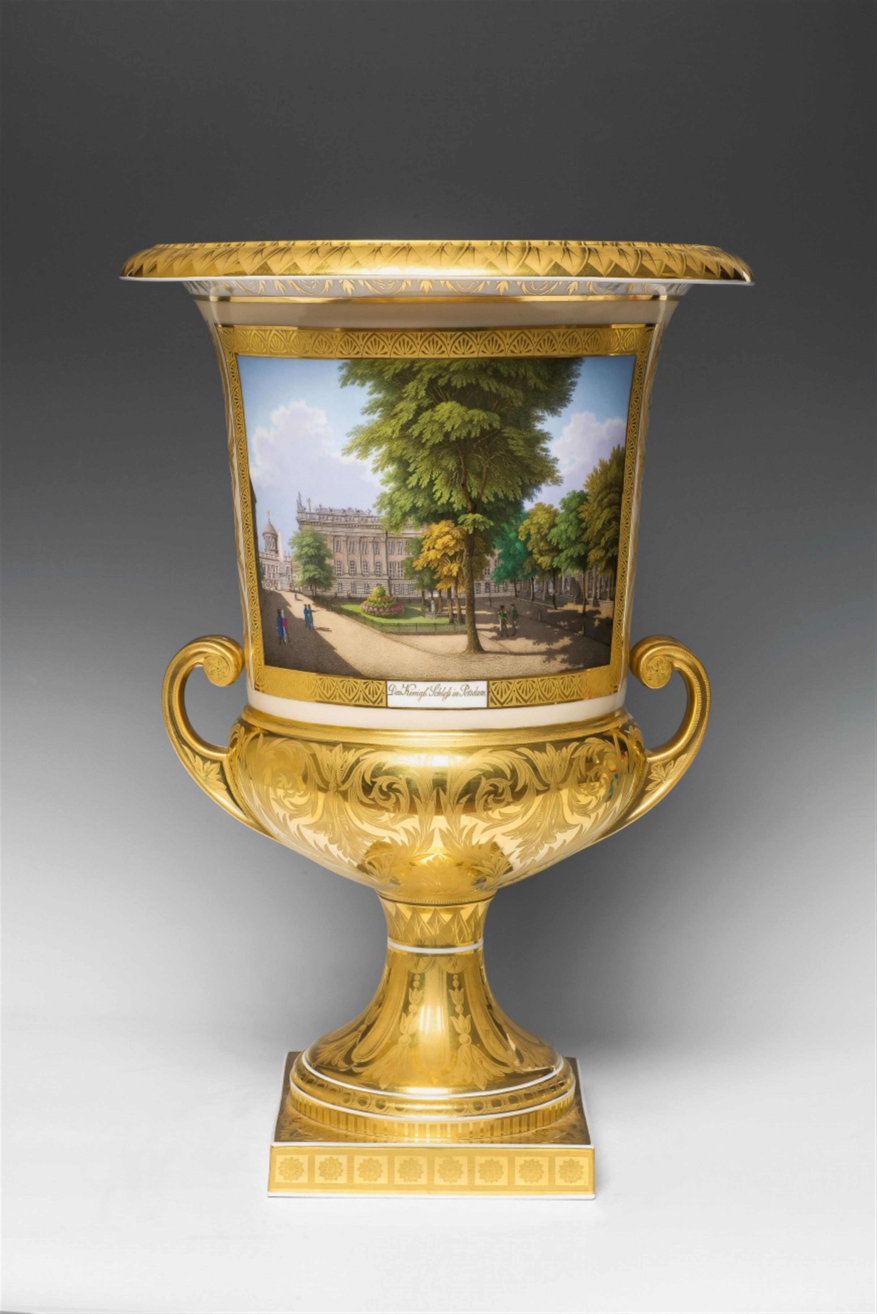 A Berlin KPM porcelain urn with views of Potsdam - 