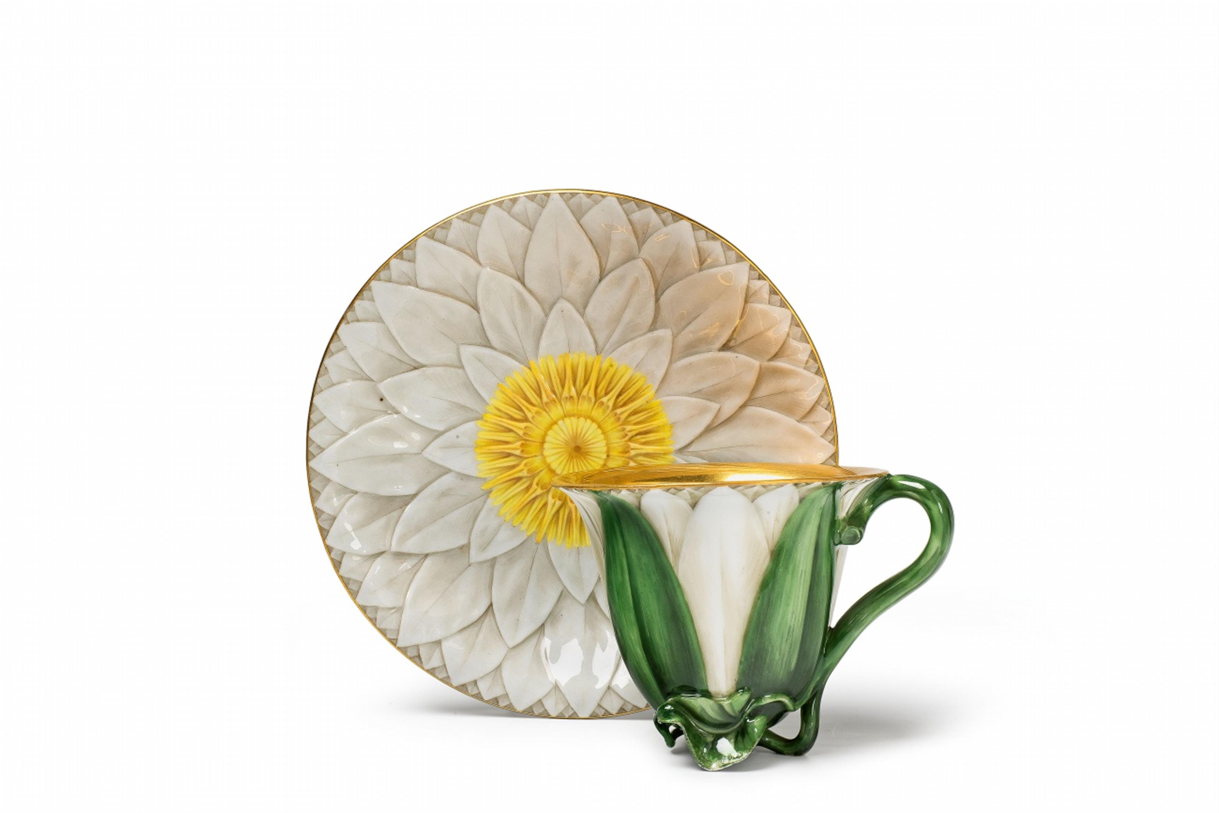 A Berlin KPM porcelain lotus flower cup and saucer - image-1