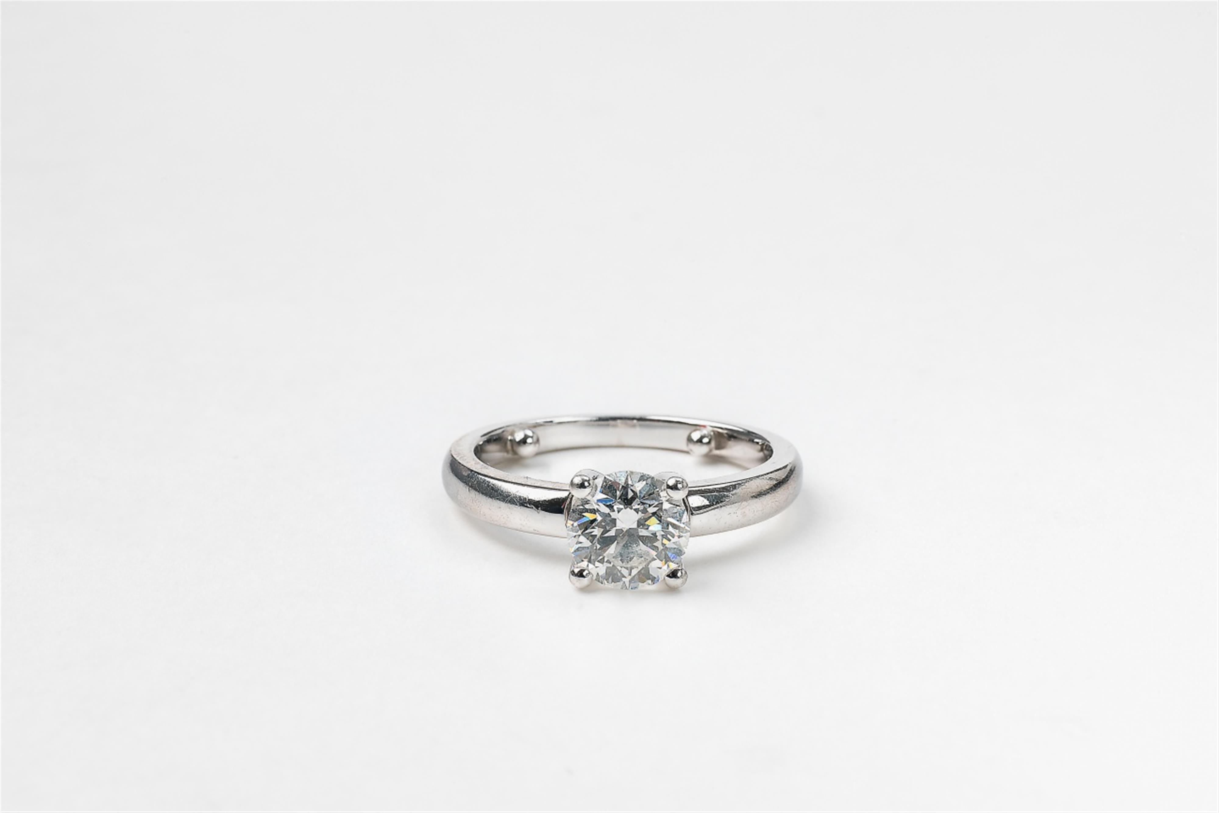 An 18k white gold diamond solitaire ring - image-1