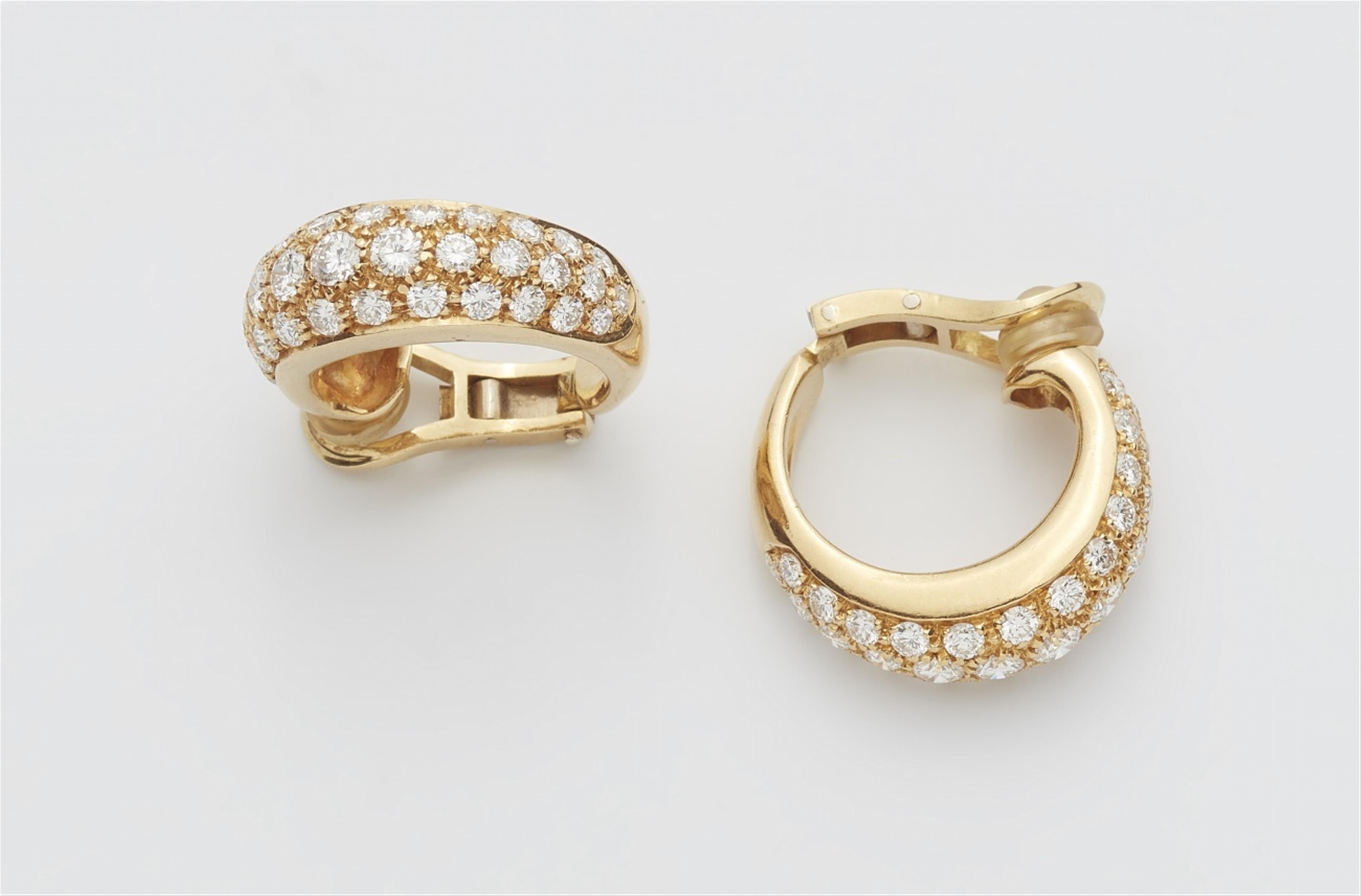 A pair of 18k gold and diamond clip earrings - image-1