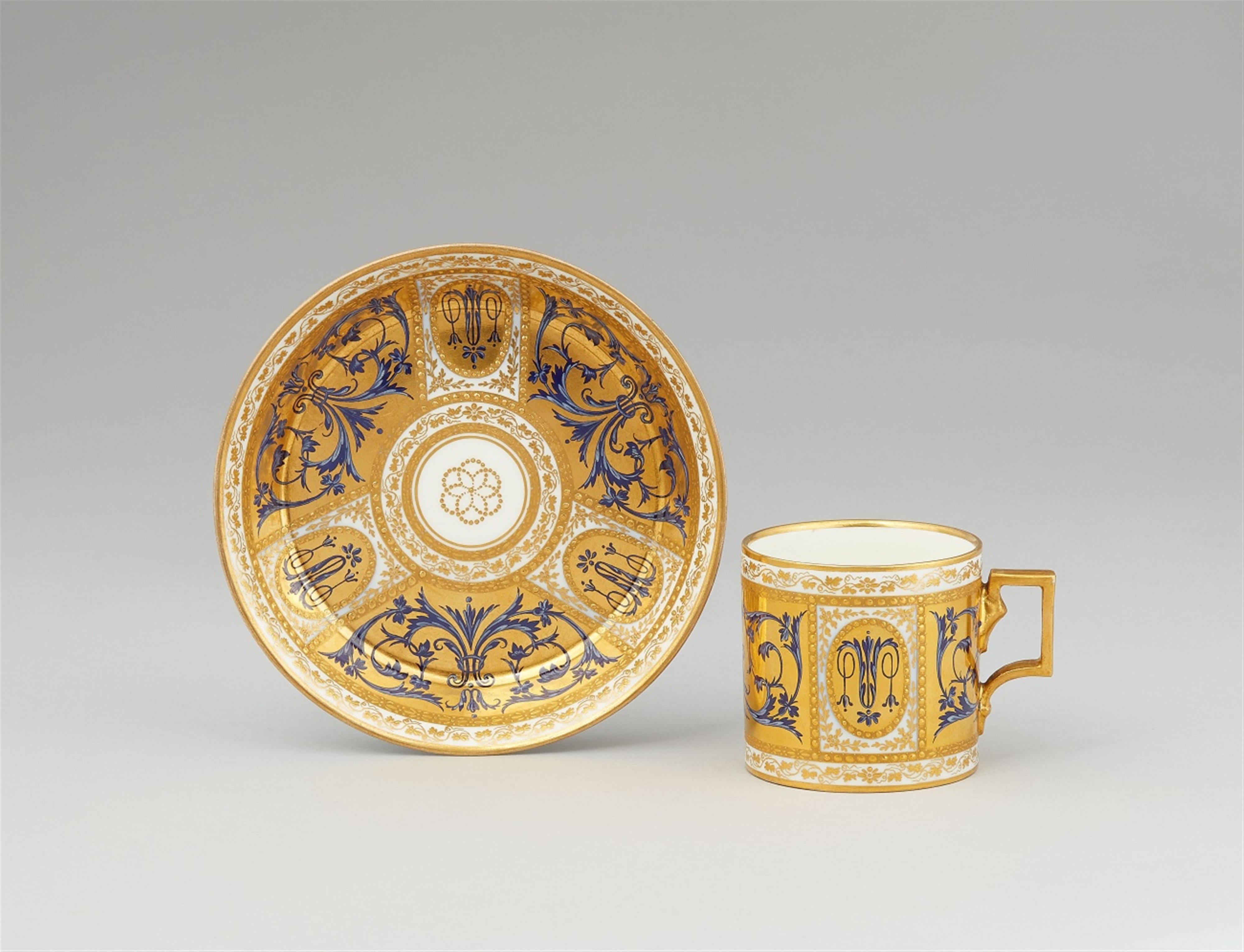 A Vienna porcelain cup and saucer with blue arabesques - image-1