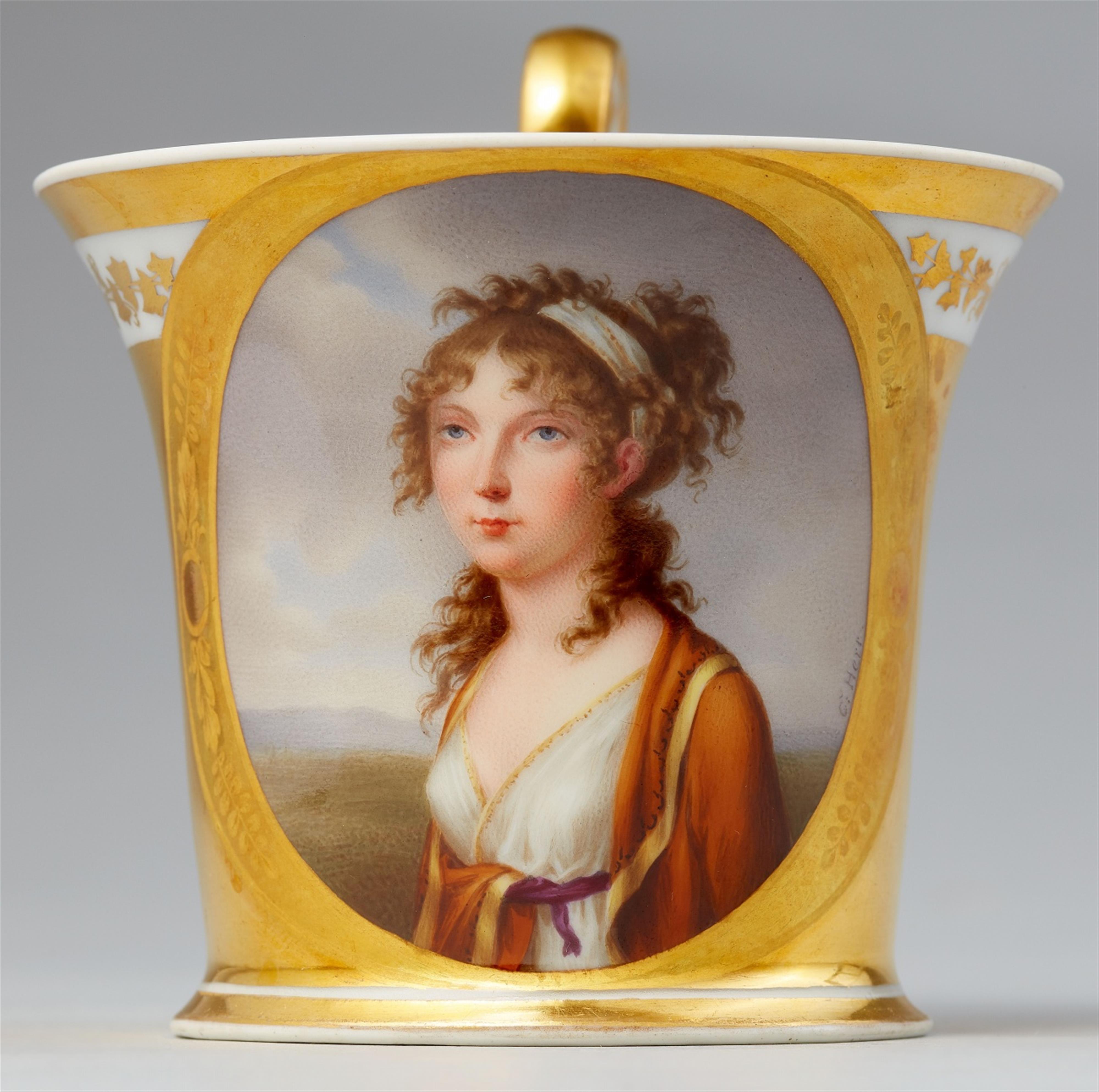 A Vienna porcelain cup and saucer with a portrait of a young lady - image-2