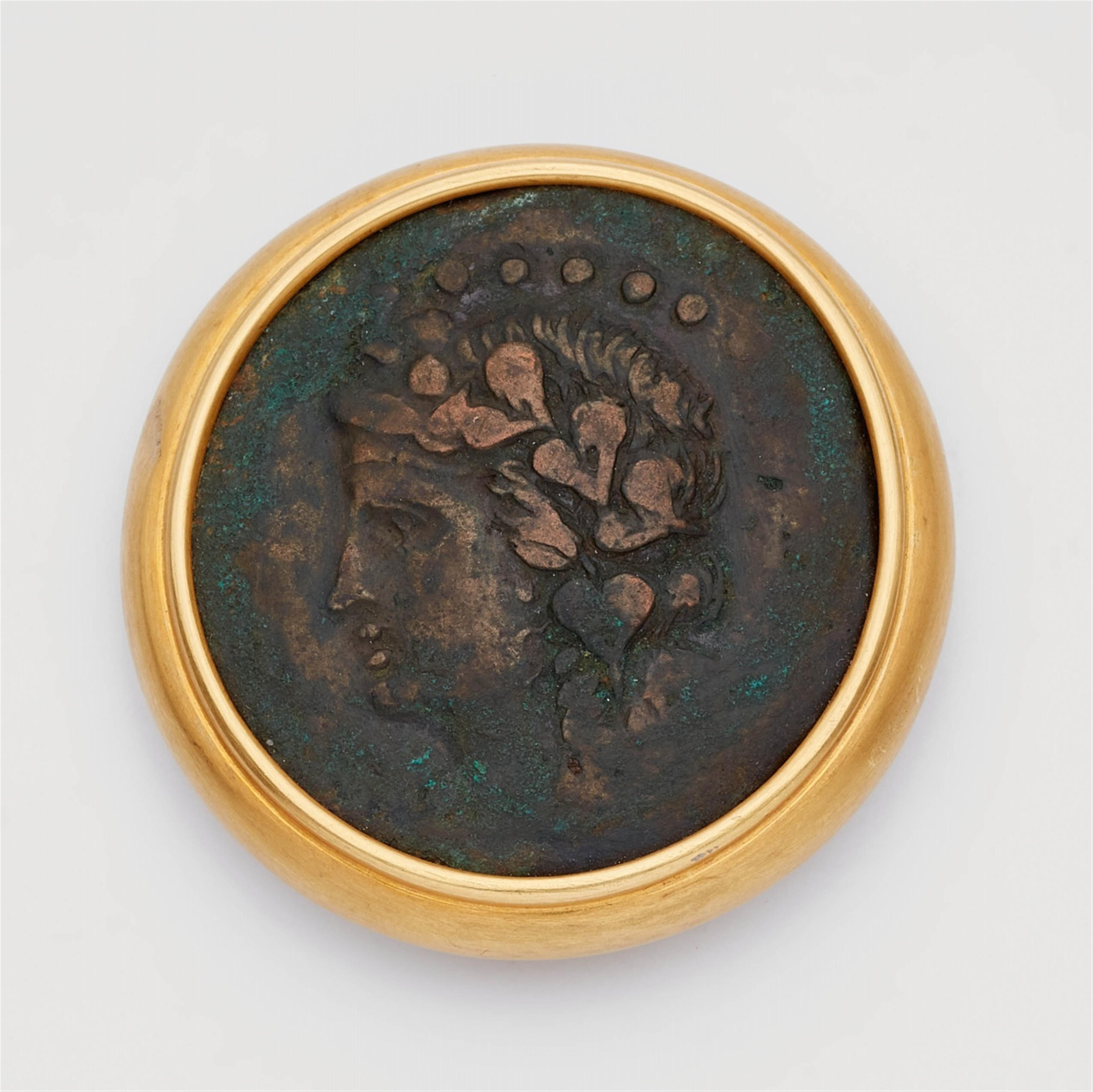 An 18k gold brooch with a Hellenistic bronze coin - image-1