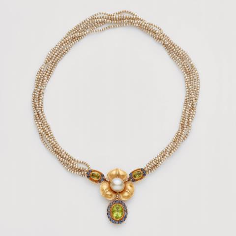 An 18k gold and natural pearl necklace with a coloured stone pendant - 