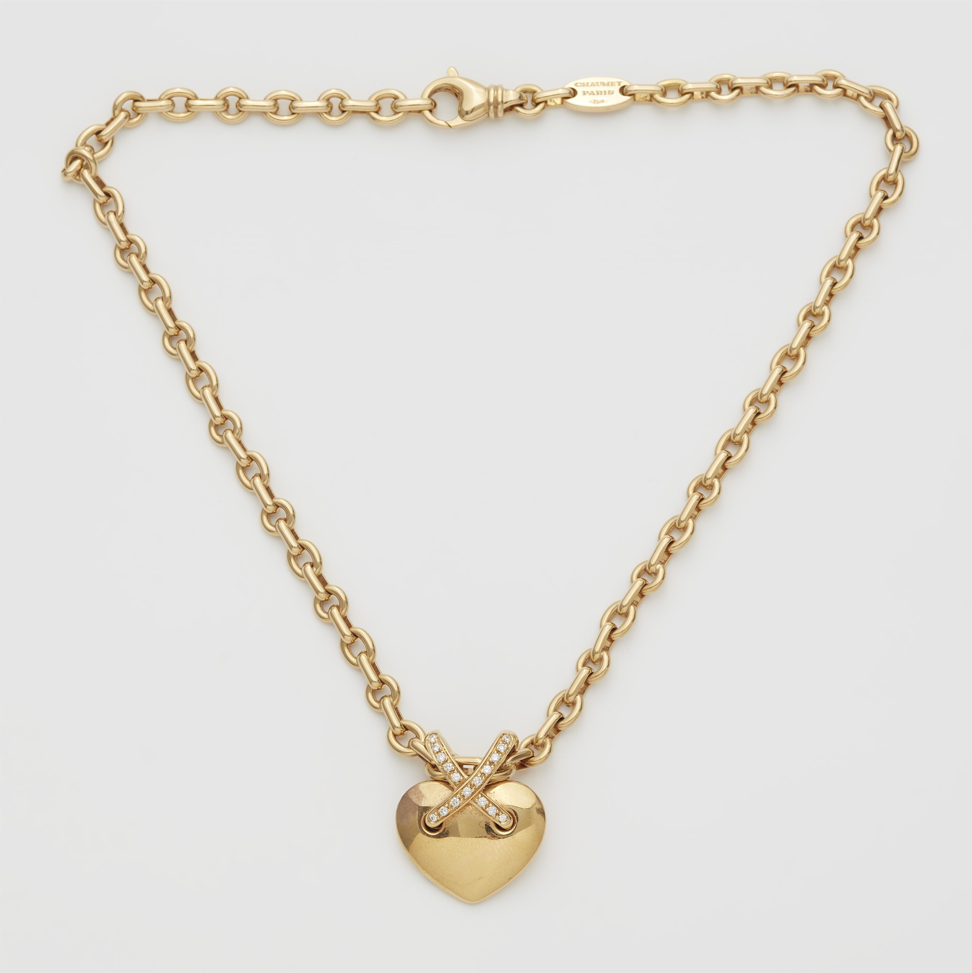 A French 18k gold and diamond link necklace with "Liens croises" heart pendant. - 