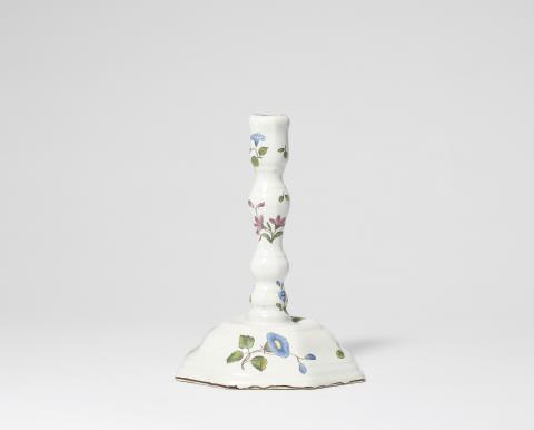 A Strasbourg faience candlestick with "fleurs esseulées" - 