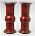 A rare pair of Berlin red lacquer painted faience vases. - image-3