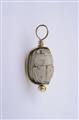 An 18k gold and carved steatite scarab pendant. - image-1
