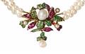 A 14k gold and Oriental pearl necklace encorporating a floral brooch. - image-2