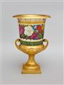 A pair of Berlin KPM porcelain krater form vases with floral and foliate décor. - image-1