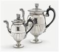 A pair of St. Petersburg silver interior gilt pitchers. Comprising coffee and hot milk jug. Marks of Gotthard Ferdinand Stang, 1816. - image-1