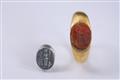 An ancient Roman gold intaglio ring. - image-1