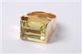 An 18k gold ring with a yellow citrine. - image-1